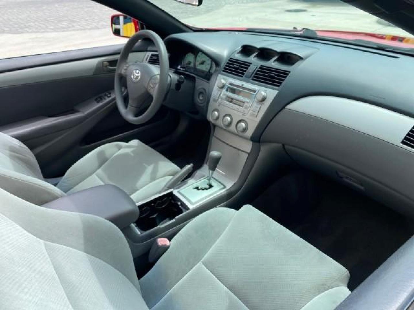 2004 Absolutely Red /Dark Stone Toyota Camry Solara CONV SE 1 OWNER 74972 Mi (4T1FA38P64U) with an 3.3L DOHC SMPI VVT-i 24-Valve V6 Engine engine, Automatic transmission, located at 4701 North Dixie Hwy, Pompano Beach, FL, 33064, (954) 422-2889, 26.240938, -80.123474 - OUR WEBPAGE FLORIDACARS1.COM HAS OVER 100 PHOTOS AND FREE CARFAX LINK 2004 Toyota Camry Solara SE V6 Convertible 3.3L V6 F DOHC 24V Gasoline 29 MPG Front Wheel Drive Features ABS Brakes Air Conditioning Alloy Wheels AM/FM Stereo Automatic Transmission Cassette Player CD Audio Cloth Seats Cruise Cont- Photo#53