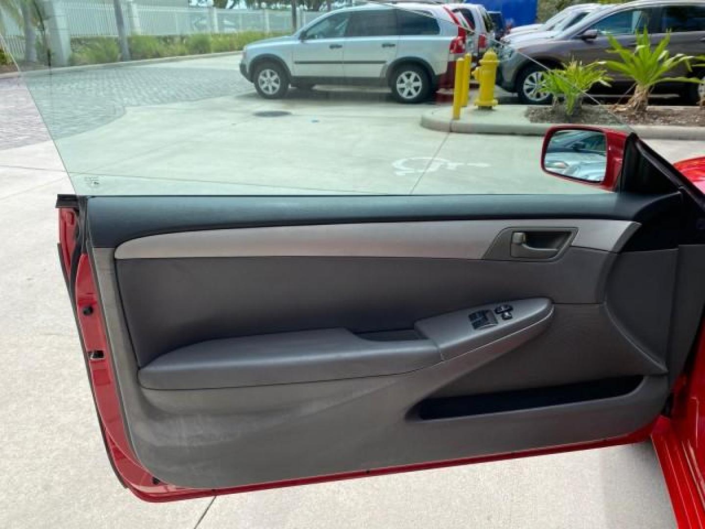 2004 Absolutely Red /Dark Stone Toyota Camry Solara CONV SE 1 OWNER 74972 Mi (4T1FA38P64U) with an 3.3L DOHC SMPI VVT-i 24-Valve V6 Engine engine, Automatic transmission, located at 4701 North Dixie Hwy, Pompano Beach, FL, 33064, (954) 422-2889, 26.240938, -80.123474 - OUR WEBPAGE FLORIDACARS1.COM HAS OVER 100 PHOTOS AND FREE CARFAX LINK 2004 Toyota Camry Solara SE V6 Convertible 3.3L V6 F DOHC 24V Gasoline 29 MPG Front Wheel Drive Features ABS Brakes Air Conditioning Alloy Wheels AM/FM Stereo Automatic Transmission Cassette Player CD Audio Cloth Seats Cruise Cont- Photo#63