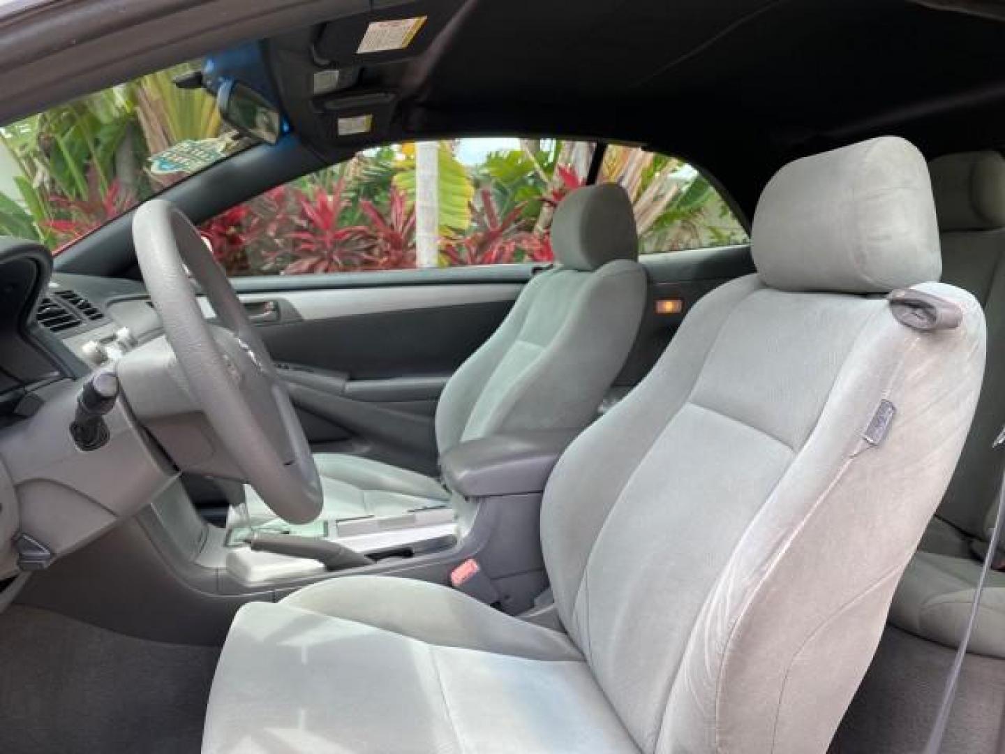 2004 Absolutely Red /Dark Stone Toyota Camry Solara CONV SE 1 OWNER 74972 Mi (4T1FA38P64U) with an 3.3L DOHC SMPI VVT-i 24-Valve V6 Engine engine, Automatic transmission, located at 4701 North Dixie Hwy, Pompano Beach, FL, 33064, (954) 422-2889, 26.240938, -80.123474 - OUR WEBPAGE FLORIDACARS1.COM HAS OVER 100 PHOTOS AND FREE CARFAX LINK 2004 Toyota Camry Solara SE V6 Convertible 3.3L V6 F DOHC 24V Gasoline 29 MPG Front Wheel Drive Features ABS Brakes Air Conditioning Alloy Wheels AM/FM Stereo Automatic Transmission Cassette Player CD Audio Cloth Seats Cruise Cont- Photo#64