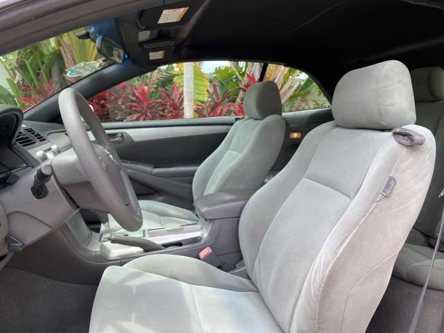2004 Absolutely Red /Dark Stone Toyota Camry Solara CONV SE 1 OWNER 74972 Mi (4T1FA38P64U) with an 3.3L DOHC SMPI VVT-i 24-Valve V6 Engine engine, Automatic transmission, located at 4701 North Dixie Hwy, Pompano Beach, FL, 33064, (954) 422-2889, 26.240938, -80.123474 - OUR WEBPAGE FLORIDACARS1.COM HAS OVER 100 PHOTOS AND FREE CARFAX LINK 2004 Toyota Camry Solara SE V6 Convertible 3.3L V6 F DOHC 24V Gasoline 29 MPG Front Wheel Drive Features ABS Brakes Air Conditioning Alloy Wheels AM/FM Stereo Automatic Transmission Cassette Player CD Audio Cloth Seats Cruise Cont - Photo#64