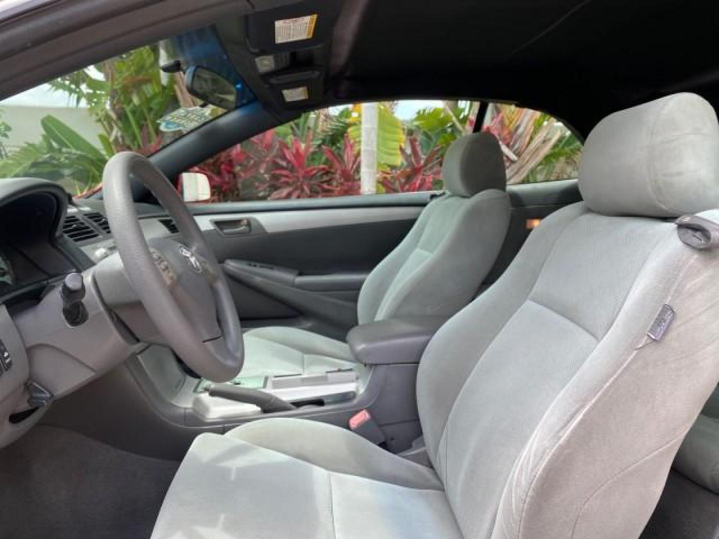 2004 Absolutely Red /Dark Stone Toyota Camry Solara CONV SE 1 OWNER 74972 Mi (4T1FA38P64U) with an 3.3L DOHC SMPI VVT-i 24-Valve V6 Engine engine, Automatic transmission, located at 4701 North Dixie Hwy, Pompano Beach, FL, 33064, (954) 422-2889, 26.240938, -80.123474 - OUR WEBPAGE FLORIDACARS1.COM HAS OVER 100 PHOTOS AND FREE CARFAX LINK 2004 Toyota Camry Solara SE V6 Convertible 3.3L V6 F DOHC 24V Gasoline 29 MPG Front Wheel Drive Features ABS Brakes Air Conditioning Alloy Wheels AM/FM Stereo Automatic Transmission Cassette Player CD Audio Cloth Seats Cruise Cont- Photo#65