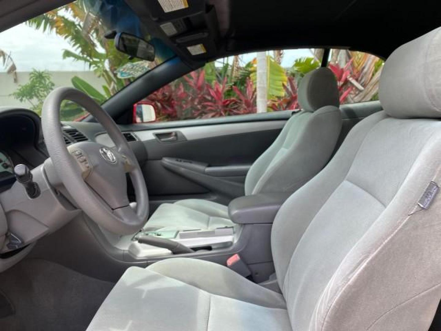 2004 Absolutely Red /Dark Stone Toyota Camry Solara CONV SE 1 OWNER 74972 Mi (4T1FA38P64U) with an 3.3L DOHC SMPI VVT-i 24-Valve V6 Engine engine, Automatic transmission, located at 4701 North Dixie Hwy, Pompano Beach, FL, 33064, (954) 422-2889, 26.240938, -80.123474 - OUR WEBPAGE FLORIDACARS1.COM HAS OVER 100 PHOTOS AND FREE CARFAX LINK 2004 Toyota Camry Solara SE V6 Convertible 3.3L V6 F DOHC 24V Gasoline 29 MPG Front Wheel Drive Features ABS Brakes Air Conditioning Alloy Wheels AM/FM Stereo Automatic Transmission Cassette Player CD Audio Cloth Seats Cruise Cont- Photo#66