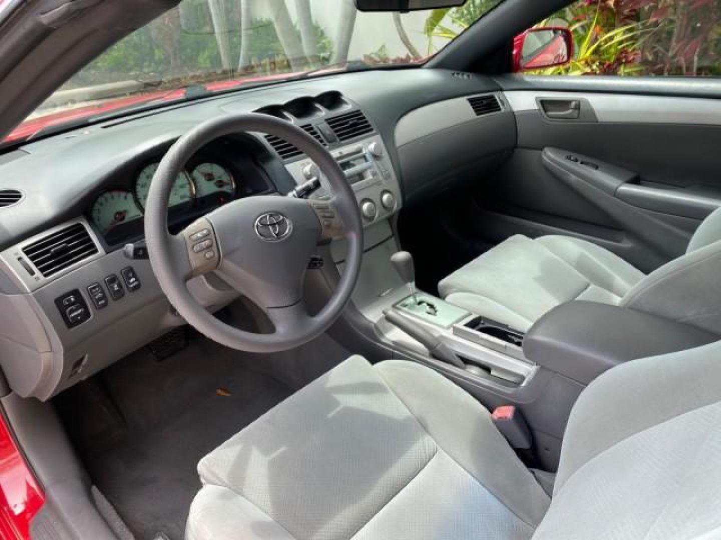 2004 Absolutely Red /Dark Stone Toyota Camry Solara CONV SE 1 OWNER 74972 Mi (4T1FA38P64U) with an 3.3L DOHC SMPI VVT-i 24-Valve V6 Engine engine, Automatic transmission, located at 4701 North Dixie Hwy, Pompano Beach, FL, 33064, (954) 422-2889, 26.240938, -80.123474 - OUR WEBPAGE FLORIDACARS1.COM HAS OVER 100 PHOTOS AND FREE CARFAX LINK 2004 Toyota Camry Solara SE V6 Convertible 3.3L V6 F DOHC 24V Gasoline 29 MPG Front Wheel Drive Features ABS Brakes Air Conditioning Alloy Wheels AM/FM Stereo Automatic Transmission Cassette Player CD Audio Cloth Seats Cruise Cont- Photo#68