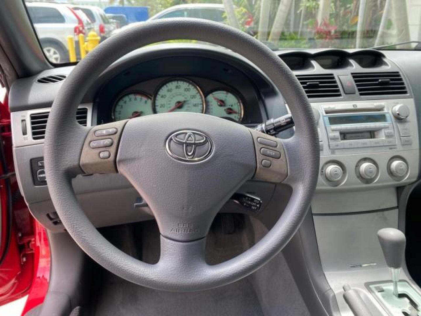 2004 Absolutely Red /Dark Stone Toyota Camry Solara CONV SE 1 OWNER 74972 Mi (4T1FA38P64U) with an 3.3L DOHC SMPI VVT-i 24-Valve V6 Engine engine, Automatic transmission, located at 4701 North Dixie Hwy, Pompano Beach, FL, 33064, (954) 422-2889, 26.240938, -80.123474 - OUR WEBPAGE FLORIDACARS1.COM HAS OVER 100 PHOTOS AND FREE CARFAX LINK 2004 Toyota Camry Solara SE V6 Convertible 3.3L V6 F DOHC 24V Gasoline 29 MPG Front Wheel Drive Features ABS Brakes Air Conditioning Alloy Wheels AM/FM Stereo Automatic Transmission Cassette Player CD Audio Cloth Seats Cruise Cont- Photo#69