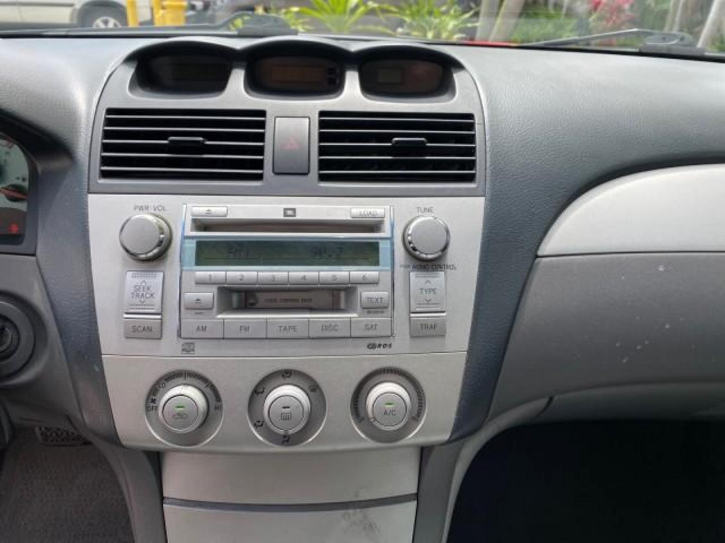2004 Absolutely Red /Dark Stone Toyota Camry Solara CONV SE 1 OWNER 74972 Mi (4T1FA38P64U) with an 3.3L DOHC SMPI VVT-i 24-Valve V6 Engine engine, Automatic transmission, located at 4701 North Dixie Hwy, Pompano Beach, FL, 33064, (954) 422-2889, 26.240938, -80.123474 - OUR WEBPAGE FLORIDACARS1.COM HAS OVER 100 PHOTOS AND FREE CARFAX LINK 2004 Toyota Camry Solara SE V6 Convertible 3.3L V6 F DOHC 24V Gasoline 29 MPG Front Wheel Drive Features ABS Brakes Air Conditioning Alloy Wheels AM/FM Stereo Automatic Transmission Cassette Player CD Audio Cloth Seats Cruise Cont- Photo#77