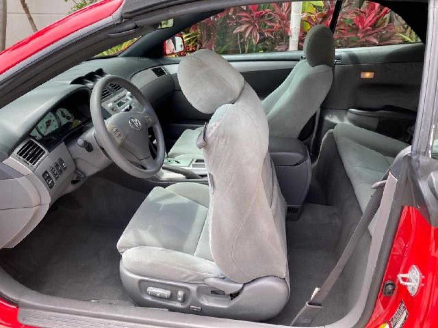 2004 Absolutely Red /Dark Stone Toyota Camry Solara CONV SE 1 OWNER 74972 Mi (4T1FA38P64U) with an 3.3L DOHC SMPI VVT-i 24-Valve V6 Engine engine, Automatic transmission, located at 4701 North Dixie Hwy, Pompano Beach, FL, 33064, (954) 422-2889, 26.240938, -80.123474 - OUR WEBPAGE FLORIDACARS1.COM HAS OVER 100 PHOTOS AND FREE CARFAX LINK 2004 Toyota Camry Solara SE V6 Convertible 3.3L V6 F DOHC 24V Gasoline 29 MPG Front Wheel Drive Features ABS Brakes Air Conditioning Alloy Wheels AM/FM Stereo Automatic Transmission Cassette Player CD Audio Cloth Seats Cruise Cont- Photo#95