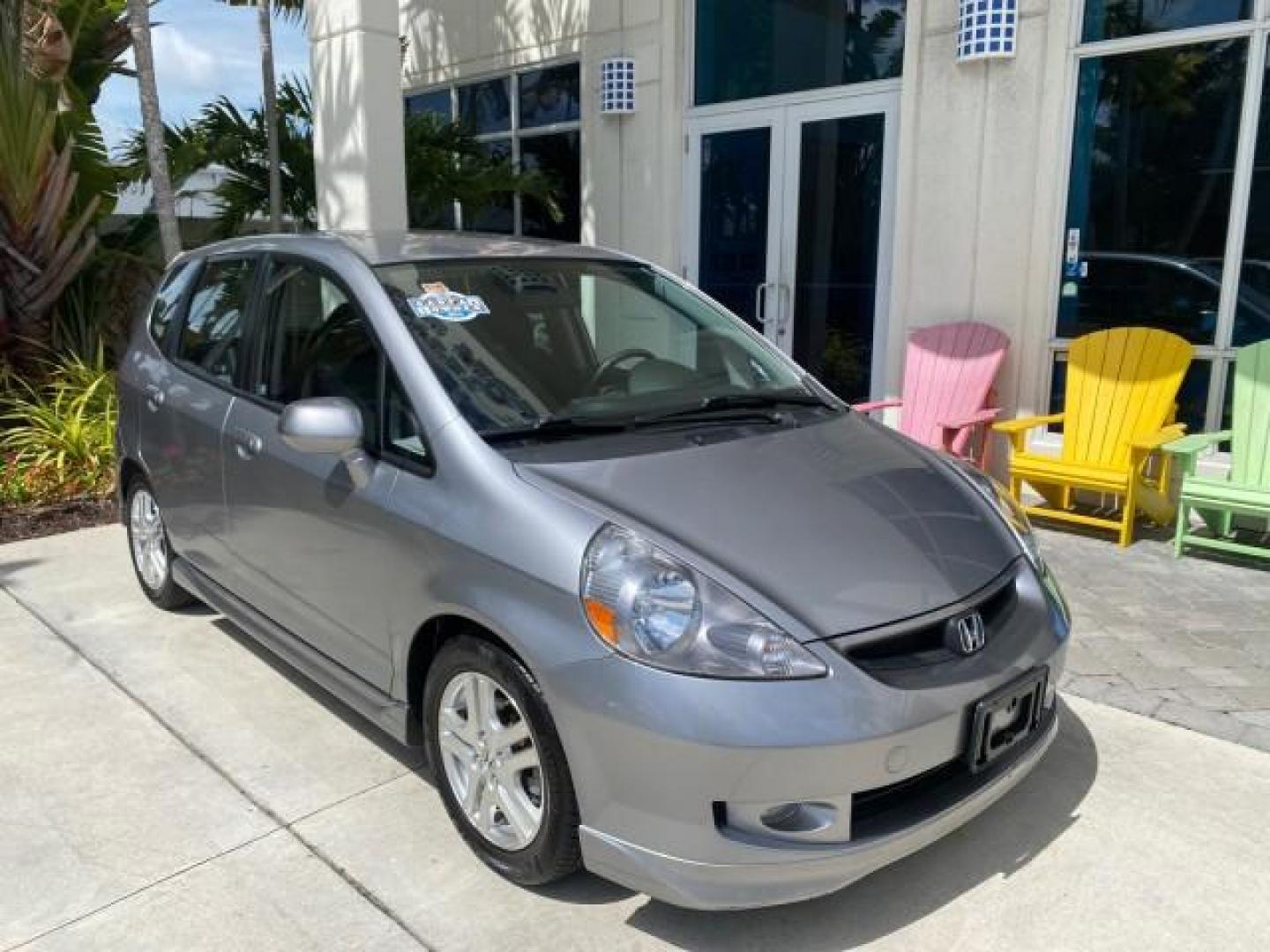 2007 Storm Silver Metallic /Black Honda Fit FIT Sport 1 OWNER LOW MILES 22,306 (JHMGD38607S) with an 1.5L SOHC PGM-FI 16-Valve VTEC I4 Engine engine, Automatic transmission, located at 4701 North Dixie Hwy, Pompano Beach, FL, 33064, (954) 422-2889, 26.240938, -80.123474 - OUR WEBPAGE FLORIDACARS1.COM HAS OVER 100 PHOTOS AND FREE CARFAX LINK 2007 Honda Fit Sport 1 OWNER Hatchback 4 DR 1.5L I4 F SOHC Gasoline 37 MPG Front Wheel Drive Features ABS Brakes Air Conditioning Alloy Wheels AM/FM Stereo Automatic Transmission Auxiliary Audio Input CD Audio Cloth Seats Cruise C- Photo#1