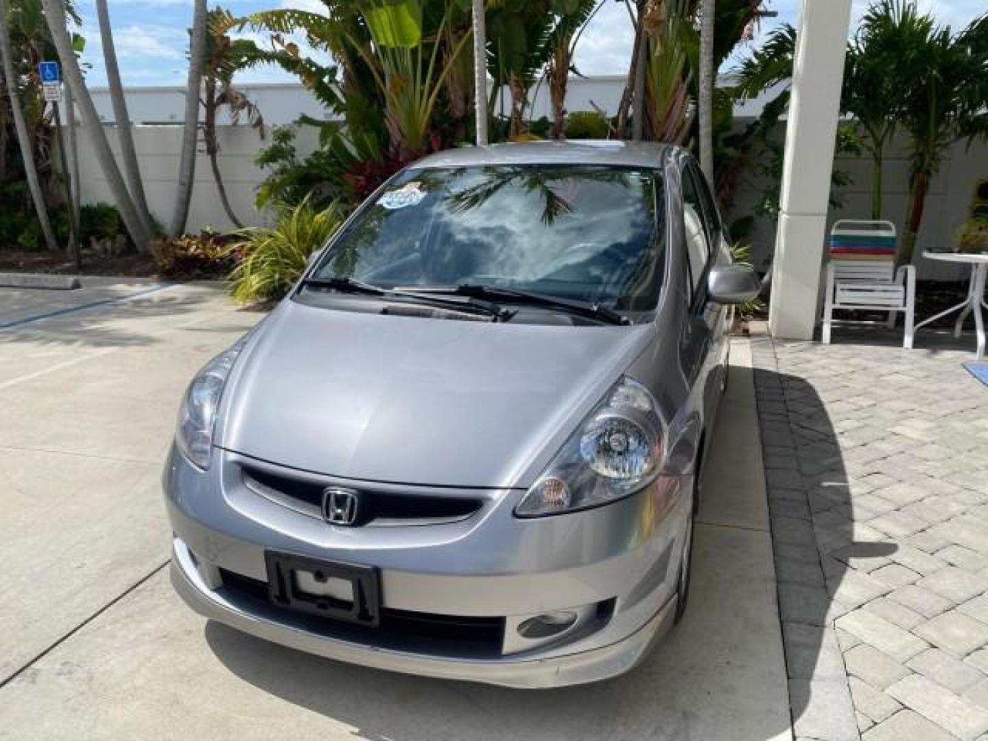 2007 Storm Silver Metallic /Black Honda Fit FIT Sport 1 OWNER LOW MILES 22,306 (JHMGD38607S) with an 1.5L SOHC PGM-FI 16-Valve VTEC I4 Engine engine, Automatic transmission, located at 4701 North Dixie Hwy, Pompano Beach, FL, 33064, (954) 422-2889, 26.240938, -80.123474 - OUR WEBPAGE FLORIDACARS1.COM HAS OVER 100 PHOTOS AND FREE CARFAX LINK 2007 Honda Fit Sport 1 OWNER Hatchback 4 DR 1.5L I4 F SOHC Gasoline 37 MPG Front Wheel Drive Features ABS Brakes Air Conditioning Alloy Wheels AM/FM Stereo Automatic Transmission Auxiliary Audio Input CD Audio Cloth Seats Cruise C- Photo#3