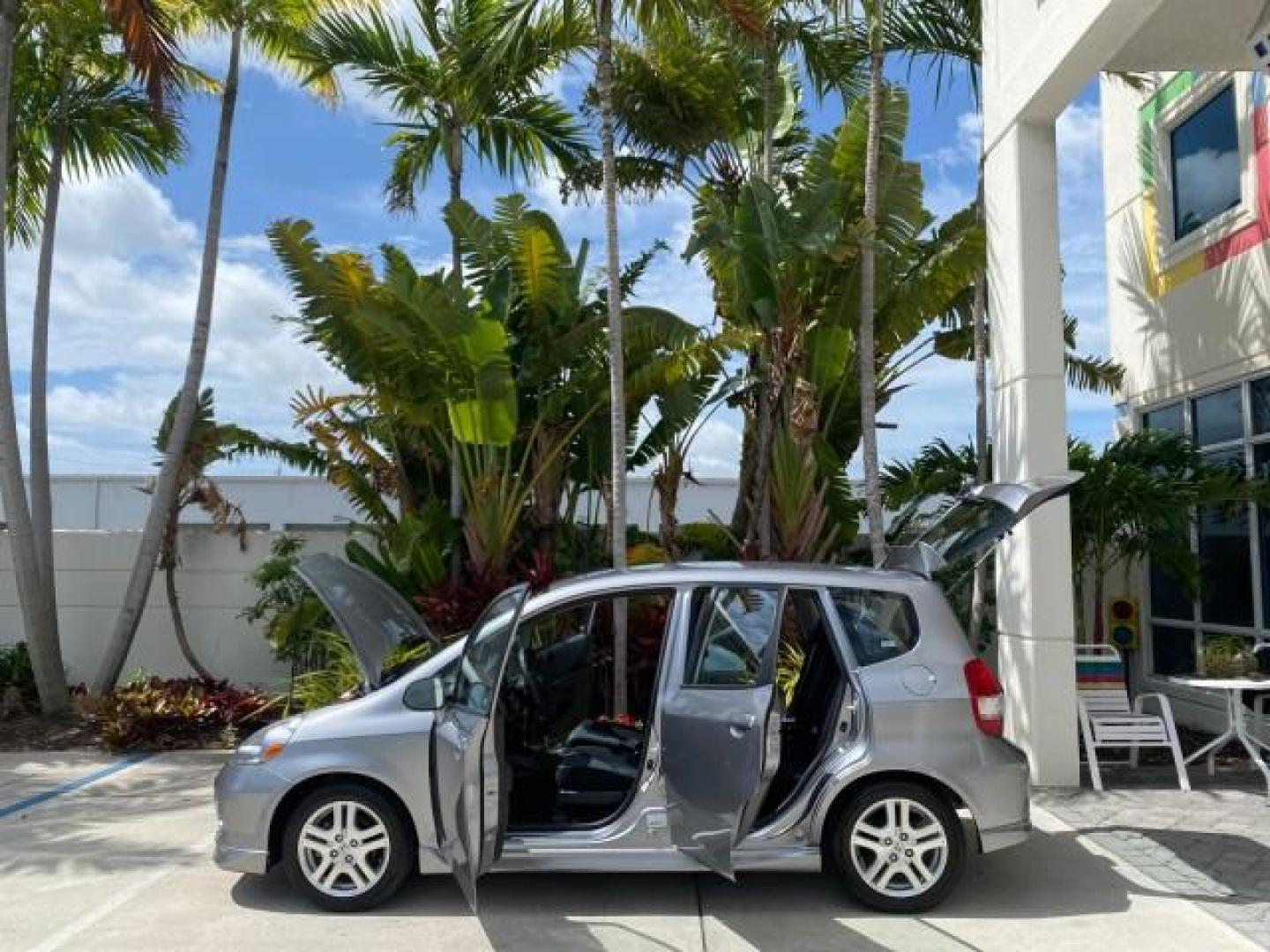 2007 Storm Silver Metallic /Black Honda Fit FIT Sport 1 OWNER LOW MILES 22,306 (JHMGD38607S) with an 1.5L SOHC PGM-FI 16-Valve VTEC I4 Engine engine, Automatic transmission, located at 4701 North Dixie Hwy, Pompano Beach, FL, 33064, (954) 422-2889, 26.240938, -80.123474 - OUR WEBPAGE FLORIDACARS1.COM HAS OVER 100 PHOTOS AND FREE CARFAX LINK 2007 Honda Fit Sport 1 OWNER Hatchback 4 DR 1.5L I4 F SOHC Gasoline 37 MPG Front Wheel Drive Features ABS Brakes Air Conditioning Alloy Wheels AM/FM Stereo Automatic Transmission Auxiliary Audio Input CD Audio Cloth Seats Cruise C- Photo#8