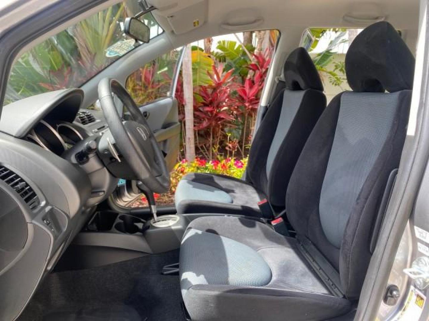 2007 Storm Silver Metallic /Black Honda Fit FIT Sport 1 OWNER LOW MILES 22,306 (JHMGD38607S) with an 1.5L SOHC PGM-FI 16-Valve VTEC I4 Engine engine, Automatic transmission, located at 4701 North Dixie Hwy, Pompano Beach, FL, 33064, (954) 422-2889, 26.240938, -80.123474 - OUR WEBPAGE FLORIDACARS1.COM HAS OVER 100 PHOTOS AND FREE CARFAX LINK 2007 Honda Fit Sport 1 OWNER Hatchback 4 DR 1.5L I4 F SOHC Gasoline 37 MPG Front Wheel Drive Features ABS Brakes Air Conditioning Alloy Wheels AM/FM Stereo Automatic Transmission Auxiliary Audio Input CD Audio Cloth Seats Cruise C- Photo#10
