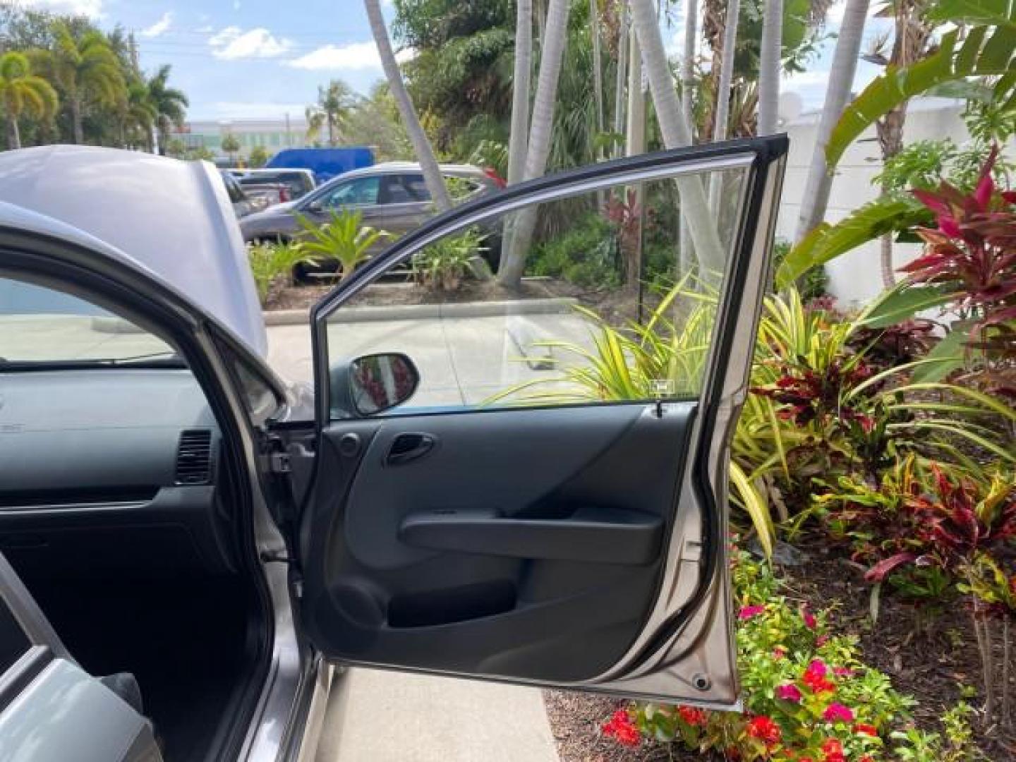 2007 Storm Silver Metallic /Black Honda Fit FIT Sport 1 OWNER LOW MILES 22,306 (JHMGD38607S) with an 1.5L SOHC PGM-FI 16-Valve VTEC I4 Engine engine, Automatic transmission, located at 4701 North Dixie Hwy, Pompano Beach, FL, 33064, (954) 422-2889, 26.240938, -80.123474 - OUR WEBPAGE FLORIDACARS1.COM HAS OVER 100 PHOTOS AND FREE CARFAX LINK 2007 Honda Fit Sport 1 OWNER Hatchback 4 DR 1.5L I4 F SOHC Gasoline 37 MPG Front Wheel Drive Features ABS Brakes Air Conditioning Alloy Wheels AM/FM Stereo Automatic Transmission Auxiliary Audio Input CD Audio Cloth Seats Cruise C- Photo#11