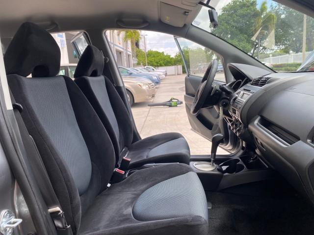 2007 Storm Silver Metallic /Black Honda Fit Sport 1 OWNER LOW MILES 22,306 (JHMGD38607S) with an 1.5L SOHC PGM-FI 16-Valve VTEC I4 Engine engine, Automatic transmission, located at 4701 North Dixie Hwy, Pompano Beach, FL, 33064, (954) 422-2889, 26.240938, -80.123474 - OUR WEBPAGE FLORIDACARS1.COM HAS OVER 100 PHOTOS AND FREE CARFAX LINK 2007 Honda Fit Sport 1 OWNER Hatchback 4 DR 1.5L I4 F SOHC Gasoline 37 MPG Front Wheel Drive Features ABS Brakes Air Conditioning Alloy Wheels AM/FM Stereo Automatic Transmission Auxiliary Audio Input CD Audio Cloth Seats Cruise C - Photo#12