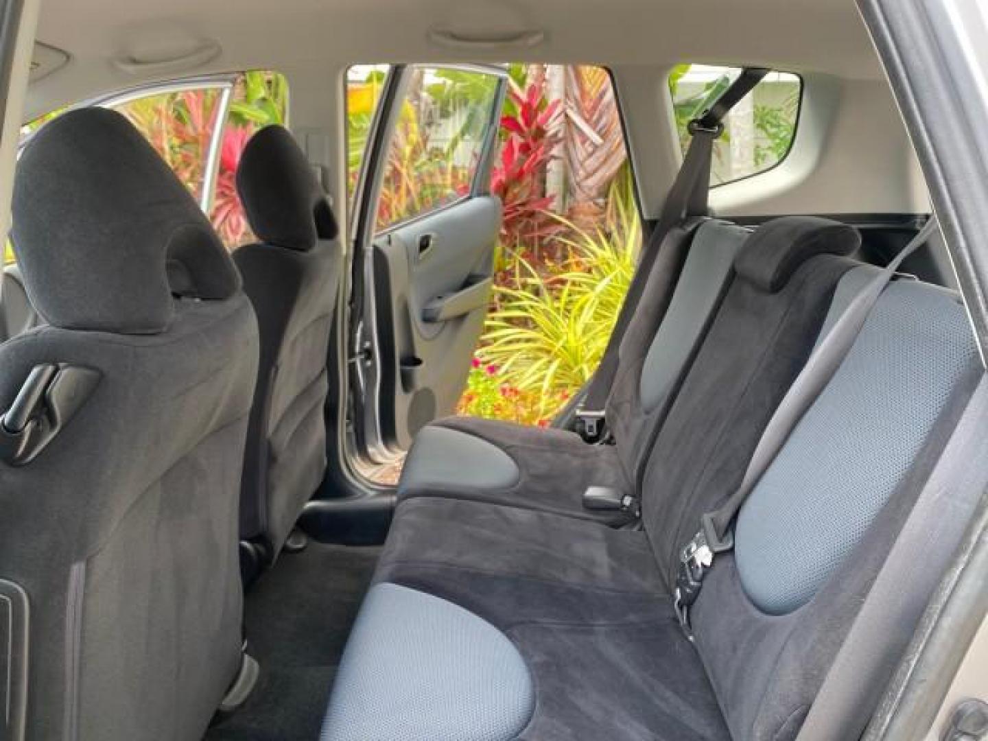 2007 Storm Silver Metallic /Black Honda Fit FIT Sport 1 OWNER LOW MILES 22,306 (JHMGD38607S) with an 1.5L SOHC PGM-FI 16-Valve VTEC I4 Engine engine, Automatic transmission, located at 4701 North Dixie Hwy, Pompano Beach, FL, 33064, (954) 422-2889, 26.240938, -80.123474 - OUR WEBPAGE FLORIDACARS1.COM HAS OVER 100 PHOTOS AND FREE CARFAX LINK 2007 Honda Fit Sport 1 OWNER Hatchback 4 DR 1.5L I4 F SOHC Gasoline 37 MPG Front Wheel Drive Features ABS Brakes Air Conditioning Alloy Wheels AM/FM Stereo Automatic Transmission Auxiliary Audio Input CD Audio Cloth Seats Cruise C- Photo#14