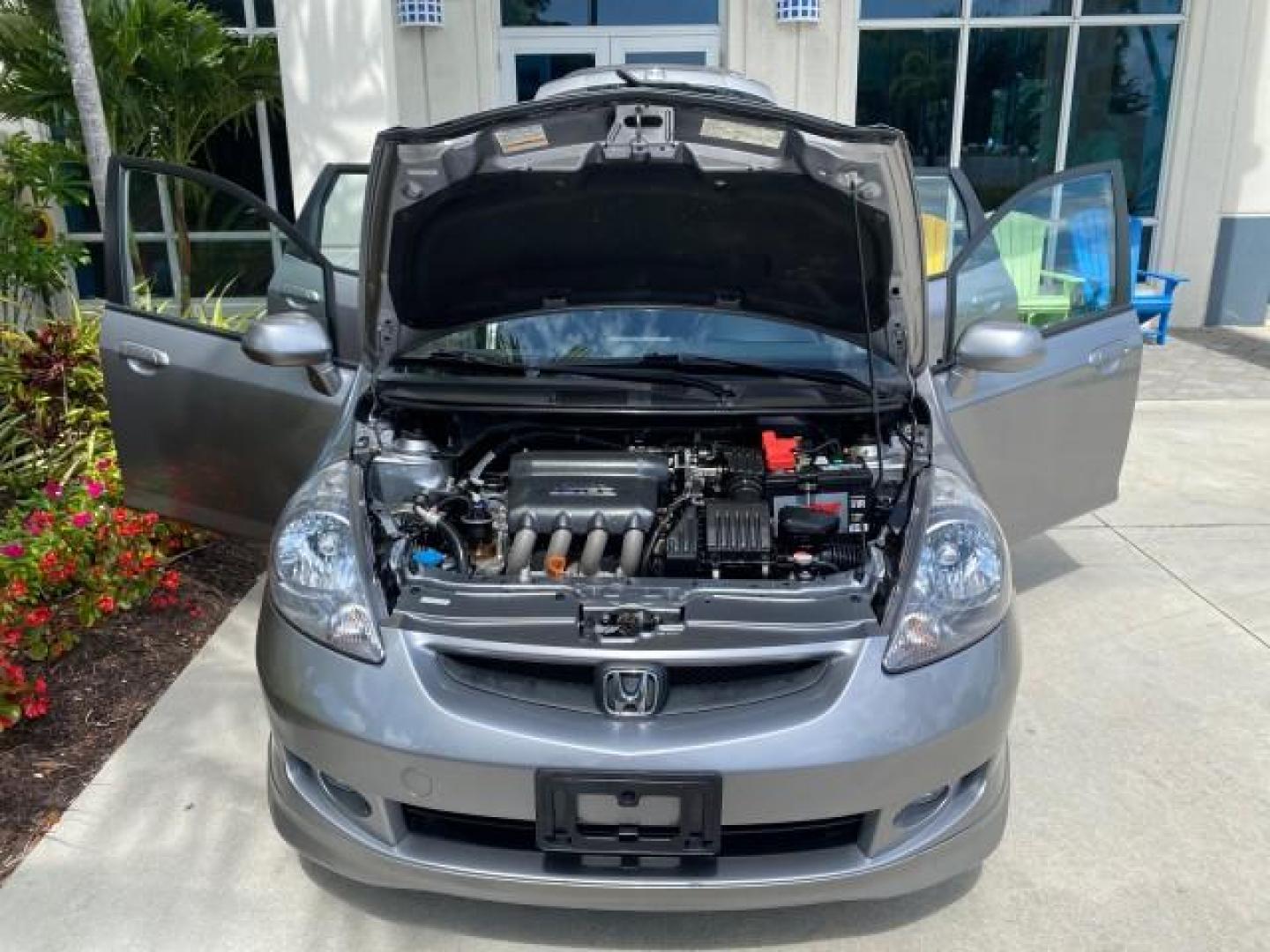 2007 Storm Silver Metallic /Black Honda Fit FIT Sport 1 OWNER LOW MILES 22,306 (JHMGD38607S) with an 1.5L SOHC PGM-FI 16-Valve VTEC I4 Engine engine, Automatic transmission, located at 4701 North Dixie Hwy, Pompano Beach, FL, 33064, (954) 422-2889, 26.240938, -80.123474 - OUR WEBPAGE FLORIDACARS1.COM HAS OVER 100 PHOTOS AND FREE CARFAX LINK 2007 Honda Fit Sport 1 OWNER Hatchback 4 DR 1.5L I4 F SOHC Gasoline 37 MPG Front Wheel Drive Features ABS Brakes Air Conditioning Alloy Wheels AM/FM Stereo Automatic Transmission Auxiliary Audio Input CD Audio Cloth Seats Cruise C- Photo#17