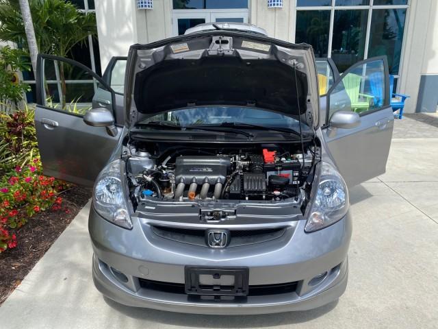 2007 Storm Silver Metallic /Black Honda Fit Sport 1 OWNER LOW MILES 22,306 (JHMGD38607S) with an 1.5L SOHC PGM-FI 16-Valve VTEC I4 Engine engine, Automatic transmission, located at 4701 North Dixie Hwy, Pompano Beach, FL, 33064, (954) 422-2889, 26.240938, -80.123474 - OUR WEBPAGE FLORIDACARS1.COM HAS OVER 100 PHOTOS AND FREE CARFAX LINK 2007 Honda Fit Sport 1 OWNER Hatchback 4 DR 1.5L I4 F SOHC Gasoline 37 MPG Front Wheel Drive Features ABS Brakes Air Conditioning Alloy Wheels AM/FM Stereo Automatic Transmission Auxiliary Audio Input CD Audio Cloth Seats Cruise C - Photo#17