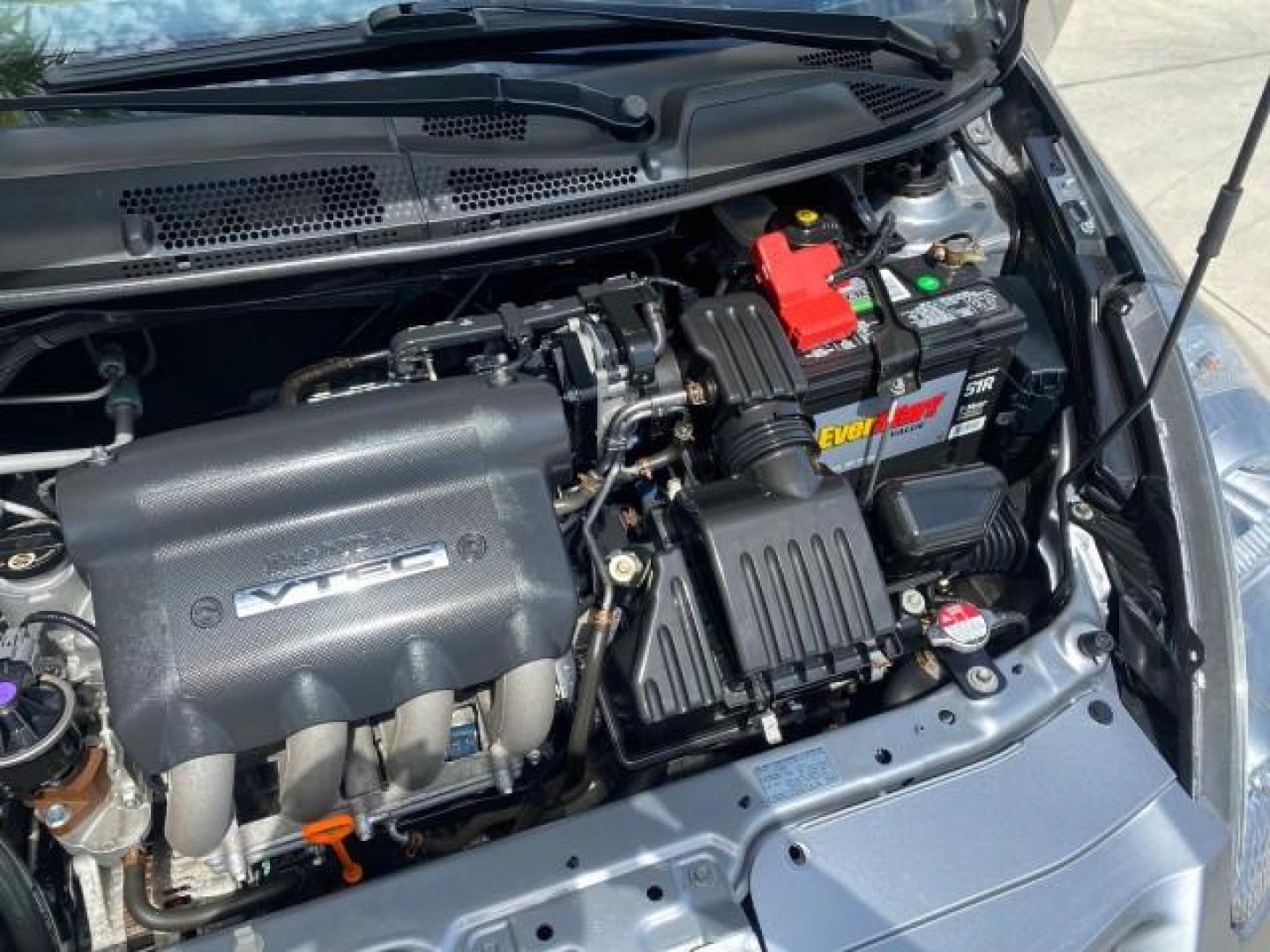 2007 Storm Silver Metallic /Black Honda Fit FIT Sport 1 OWNER LOW MILES 22,306 (JHMGD38607S) with an 1.5L SOHC PGM-FI 16-Valve VTEC I4 Engine engine, Automatic transmission, located at 4701 North Dixie Hwy, Pompano Beach, FL, 33064, (954) 422-2889, 26.240938, -80.123474 - OUR WEBPAGE FLORIDACARS1.COM HAS OVER 100 PHOTOS AND FREE CARFAX LINK 2007 Honda Fit Sport 1 OWNER Hatchback 4 DR 1.5L I4 F SOHC Gasoline 37 MPG Front Wheel Drive Features ABS Brakes Air Conditioning Alloy Wheels AM/FM Stereo Automatic Transmission Auxiliary Audio Input CD Audio Cloth Seats Cruise C- Photo#25