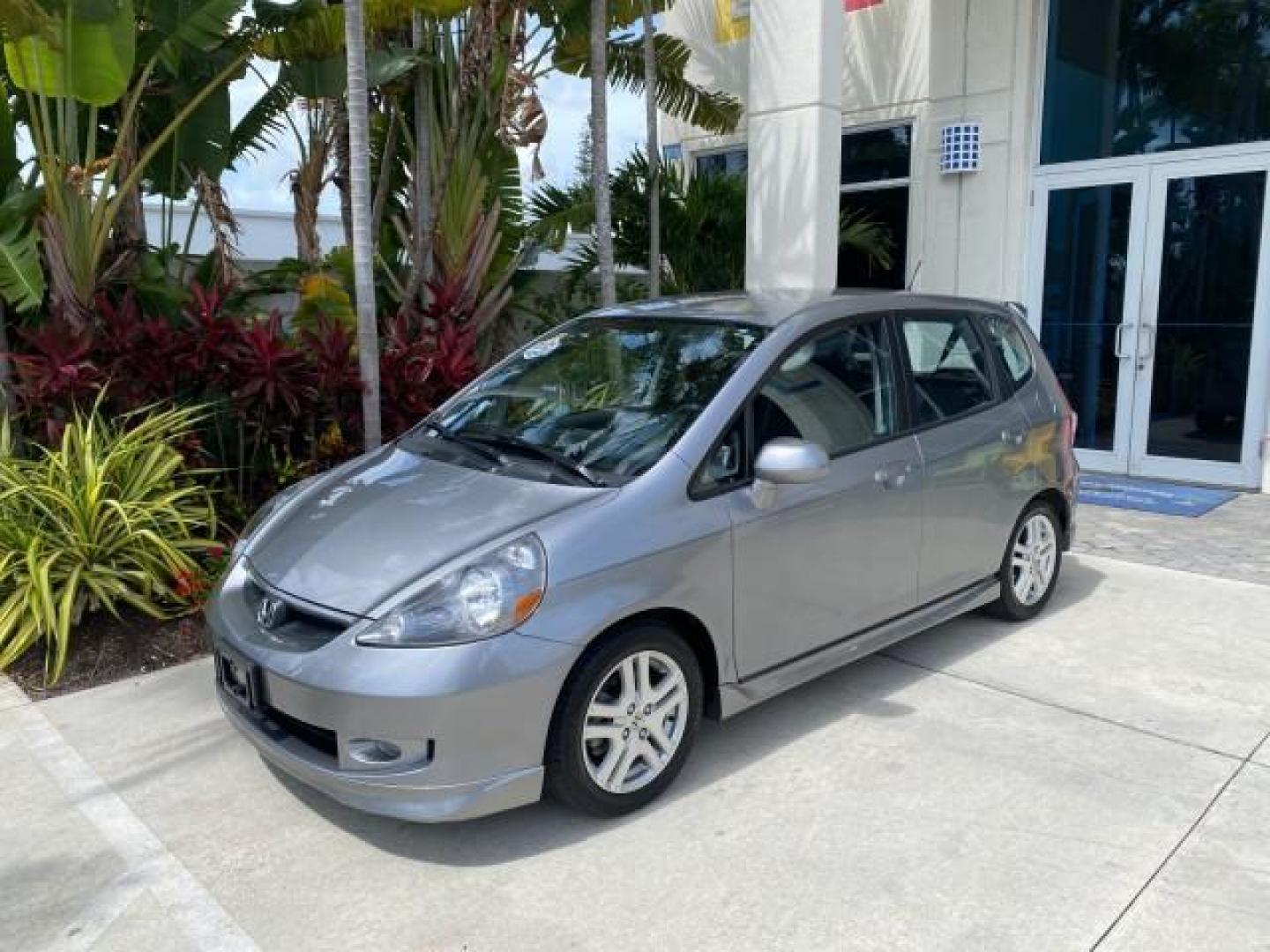 2007 Storm Silver Metallic /Black Honda Fit FIT Sport 1 OWNER LOW MILES 22,306 (JHMGD38607S) with an 1.5L SOHC PGM-FI 16-Valve VTEC I4 Engine engine, Automatic transmission, located at 4701 North Dixie Hwy, Pompano Beach, FL, 33064, (954) 422-2889, 26.240938, -80.123474 - OUR WEBPAGE FLORIDACARS1.COM HAS OVER 100 PHOTOS AND FREE CARFAX LINK 2007 Honda Fit Sport 1 OWNER Hatchback 4 DR 1.5L I4 F SOHC Gasoline 37 MPG Front Wheel Drive Features ABS Brakes Air Conditioning Alloy Wheels AM/FM Stereo Automatic Transmission Auxiliary Audio Input CD Audio Cloth Seats Cruise C- Photo#28