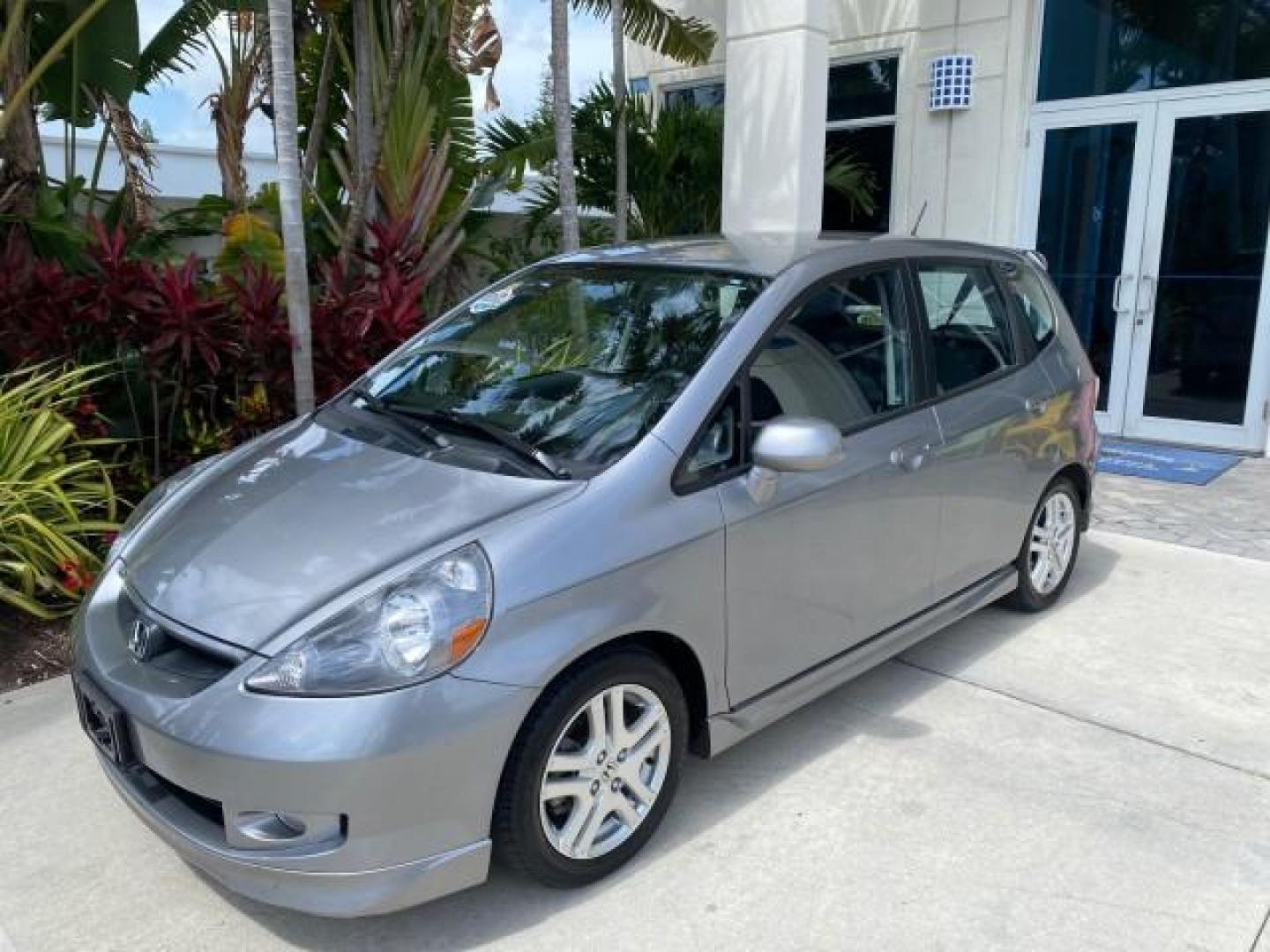 2007 Storm Silver Metallic /Black Honda Fit FIT Sport 1 OWNER LOW MILES 22,306 (JHMGD38607S) with an 1.5L SOHC PGM-FI 16-Valve VTEC I4 Engine engine, Automatic transmission, located at 4701 North Dixie Hwy, Pompano Beach, FL, 33064, (954) 422-2889, 26.240938, -80.123474 - OUR WEBPAGE FLORIDACARS1.COM HAS OVER 100 PHOTOS AND FREE CARFAX LINK 2007 Honda Fit Sport 1 OWNER Hatchback 4 DR 1.5L I4 F SOHC Gasoline 37 MPG Front Wheel Drive Features ABS Brakes Air Conditioning Alloy Wheels AM/FM Stereo Automatic Transmission Auxiliary Audio Input CD Audio Cloth Seats Cruise C- Photo#29