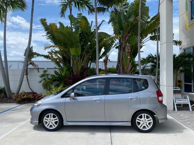 2007 Storm Silver Metallic /Black Honda Fit Sport 1 OWNER LOW MILES 22,306 (JHMGD38607S) with an 1.5L SOHC PGM-FI 16-Valve VTEC I4 Engine engine, Automatic transmission, located at 4701 North Dixie Hwy, Pompano Beach, FL, 33064, (954) 422-2889, 26.240938, -80.123474 - OUR WEBPAGE FLORIDACARS1.COM HAS OVER 100 PHOTOS AND FREE CARFAX LINK 2007 Honda Fit Sport 1 OWNER Hatchback 4 DR 1.5L I4 F SOHC Gasoline 37 MPG Front Wheel Drive Features ABS Brakes Air Conditioning Alloy Wheels AM/FM Stereo Automatic Transmission Auxiliary Audio Input CD Audio Cloth Seats Cruise C - Photo#30