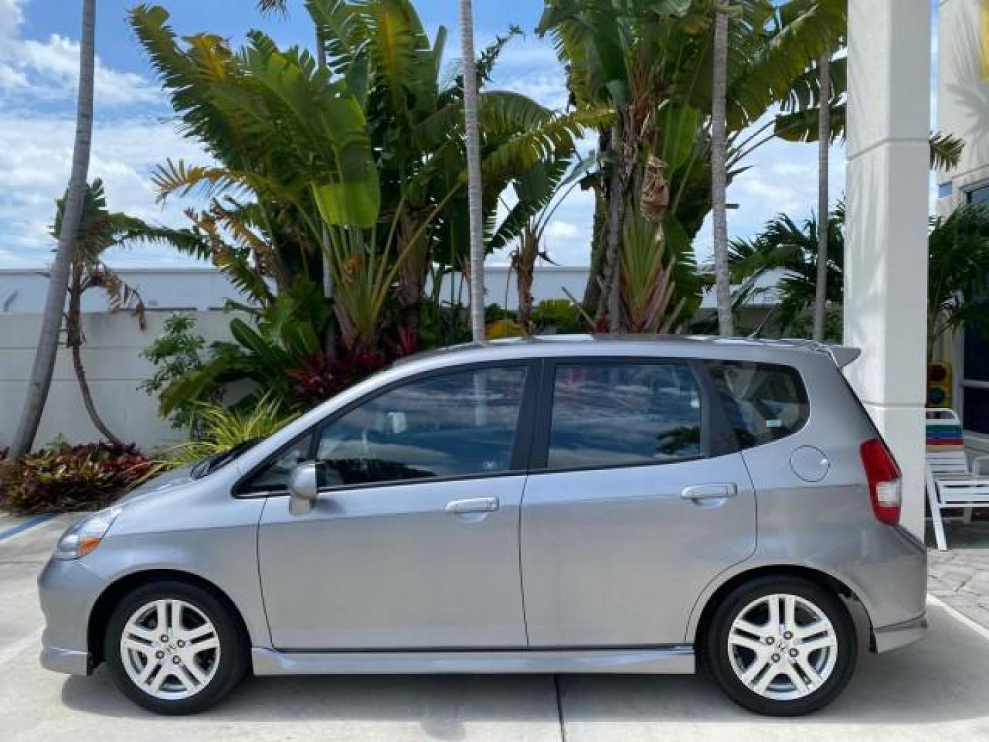 2007 Storm Silver Metallic /Black Honda Fit FIT Sport 1 OWNER LOW MILES 22,306 (JHMGD38607S) with an 1.5L SOHC PGM-FI 16-Valve VTEC I4 Engine engine, Automatic transmission, located at 4701 North Dixie Hwy, Pompano Beach, FL, 33064, (954) 422-2889, 26.240938, -80.123474 - OUR WEBPAGE FLORIDACARS1.COM HAS OVER 100 PHOTOS AND FREE CARFAX LINK 2007 Honda Fit Sport 1 OWNER Hatchback 4 DR 1.5L I4 F SOHC Gasoline 37 MPG Front Wheel Drive Features ABS Brakes Air Conditioning Alloy Wheels AM/FM Stereo Automatic Transmission Auxiliary Audio Input CD Audio Cloth Seats Cruise C- Photo#31