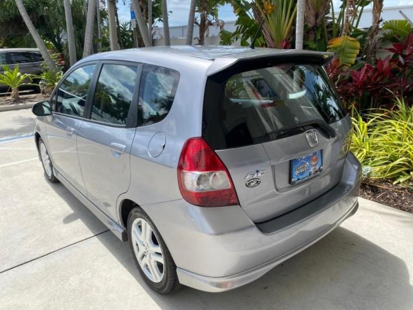2007 Storm Silver Metallic /Black Honda Fit FIT Sport 1 OWNER LOW MILES 22,306 (JHMGD38607S) with an 1.5L SOHC PGM-FI 16-Valve VTEC I4 Engine engine, Automatic transmission, located at 4701 North Dixie Hwy, Pompano Beach, FL, 33064, (954) 422-2889, 26.240938, -80.123474 - OUR WEBPAGE FLORIDACARS1.COM HAS OVER 100 PHOTOS AND FREE CARFAX LINK 2007 Honda Fit Sport 1 OWNER Hatchback 4 DR 1.5L I4 F SOHC Gasoline 37 MPG Front Wheel Drive Features ABS Brakes Air Conditioning Alloy Wheels AM/FM Stereo Automatic Transmission Auxiliary Audio Input CD Audio Cloth Seats Cruise C- Photo#33