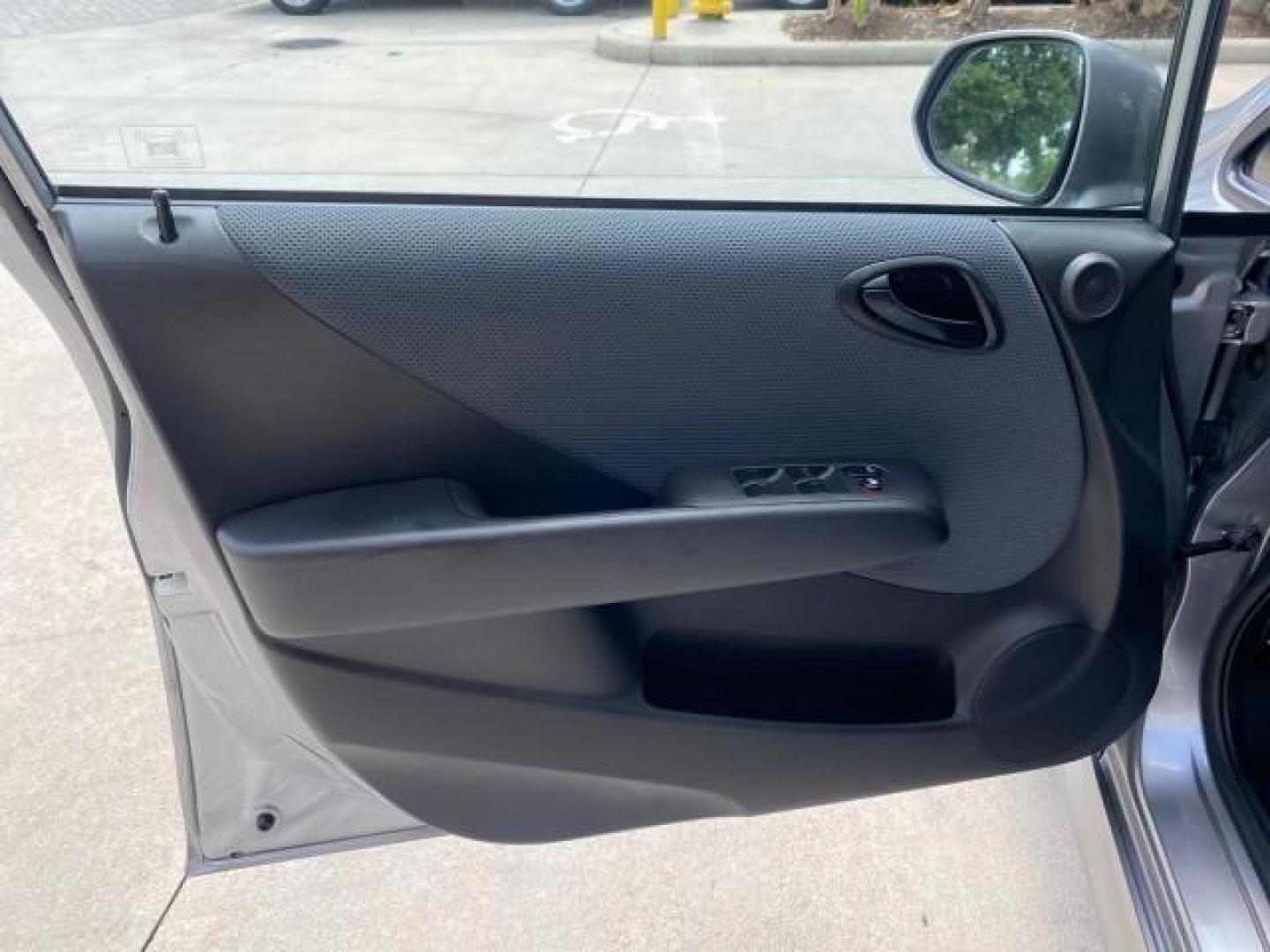 2007 Storm Silver Metallic /Black Honda Fit FIT Sport 1 OWNER LOW MILES 22,306 (JHMGD38607S) with an 1.5L SOHC PGM-FI 16-Valve VTEC I4 Engine engine, Automatic transmission, located at 4701 North Dixie Hwy, Pompano Beach, FL, 33064, (954) 422-2889, 26.240938, -80.123474 - OUR WEBPAGE FLORIDACARS1.COM HAS OVER 100 PHOTOS AND FREE CARFAX LINK 2007 Honda Fit Sport 1 OWNER Hatchback 4 DR 1.5L I4 F SOHC Gasoline 37 MPG Front Wheel Drive Features ABS Brakes Air Conditioning Alloy Wheels AM/FM Stereo Automatic Transmission Auxiliary Audio Input CD Audio Cloth Seats Cruise C- Photo#40