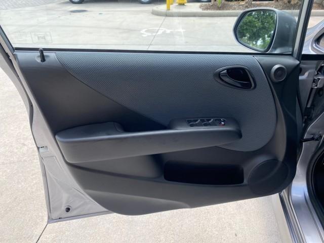 2007 Storm Silver Metallic /Black Honda Fit Sport 1 OWNER LOW MILES 22,306 (JHMGD38607S) with an 1.5L SOHC PGM-FI 16-Valve VTEC I4 Engine engine, Automatic transmission, located at 4701 North Dixie Hwy, Pompano Beach, FL, 33064, (954) 422-2889, 26.240938, -80.123474 - OUR WEBPAGE FLORIDACARS1.COM HAS OVER 100 PHOTOS AND FREE CARFAX LINK 2007 Honda Fit Sport 1 OWNER Hatchback 4 DR 1.5L I4 F SOHC Gasoline 37 MPG Front Wheel Drive Features ABS Brakes Air Conditioning Alloy Wheels AM/FM Stereo Automatic Transmission Auxiliary Audio Input CD Audio Cloth Seats Cruise C - Photo#40
