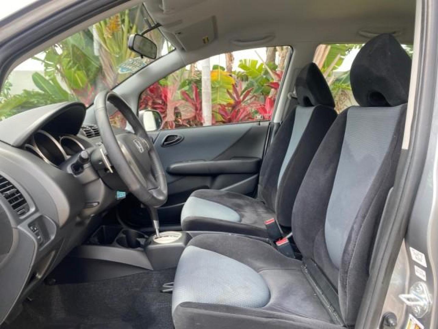 2007 Storm Silver Metallic /Black Honda Fit FIT Sport 1 OWNER LOW MILES 22,306 (JHMGD38607S) with an 1.5L SOHC PGM-FI 16-Valve VTEC I4 Engine engine, Automatic transmission, located at 4701 North Dixie Hwy, Pompano Beach, FL, 33064, (954) 422-2889, 26.240938, -80.123474 - OUR WEBPAGE FLORIDACARS1.COM HAS OVER 100 PHOTOS AND FREE CARFAX LINK 2007 Honda Fit Sport 1 OWNER Hatchback 4 DR 1.5L I4 F SOHC Gasoline 37 MPG Front Wheel Drive Features ABS Brakes Air Conditioning Alloy Wheels AM/FM Stereo Automatic Transmission Auxiliary Audio Input CD Audio Cloth Seats Cruise C- Photo#42