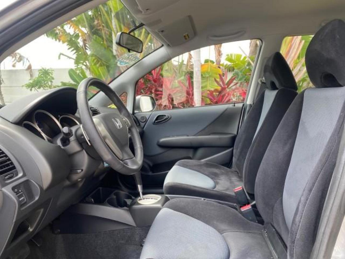 2007 Storm Silver Metallic /Black Honda Fit FIT Sport 1 OWNER LOW MILES 22,306 (JHMGD38607S) with an 1.5L SOHC PGM-FI 16-Valve VTEC I4 Engine engine, Automatic transmission, located at 4701 North Dixie Hwy, Pompano Beach, FL, 33064, (954) 422-2889, 26.240938, -80.123474 - OUR WEBPAGE FLORIDACARS1.COM HAS OVER 100 PHOTOS AND FREE CARFAX LINK 2007 Honda Fit Sport 1 OWNER Hatchback 4 DR 1.5L I4 F SOHC Gasoline 37 MPG Front Wheel Drive Features ABS Brakes Air Conditioning Alloy Wheels AM/FM Stereo Automatic Transmission Auxiliary Audio Input CD Audio Cloth Seats Cruise C- Photo#43