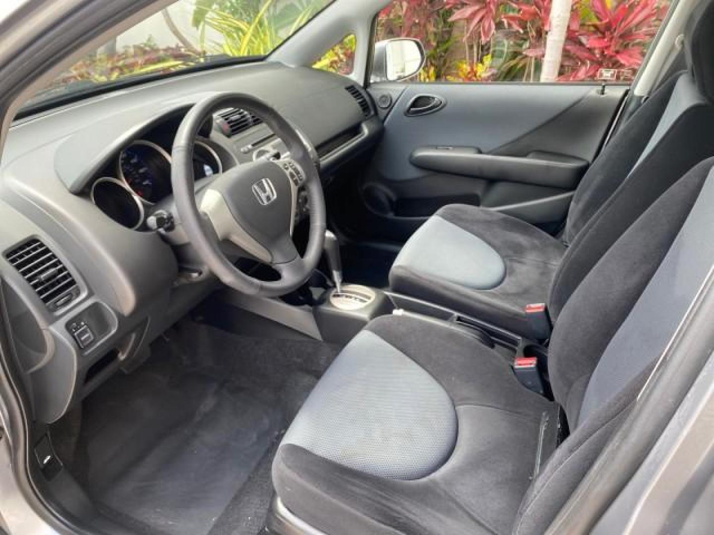 2007 Storm Silver Metallic /Black Honda Fit FIT Sport 1 OWNER LOW MILES 22,306 (JHMGD38607S) with an 1.5L SOHC PGM-FI 16-Valve VTEC I4 Engine engine, Automatic transmission, located at 4701 North Dixie Hwy, Pompano Beach, FL, 33064, (954) 422-2889, 26.240938, -80.123474 - OUR WEBPAGE FLORIDACARS1.COM HAS OVER 100 PHOTOS AND FREE CARFAX LINK 2007 Honda Fit Sport 1 OWNER Hatchback 4 DR 1.5L I4 F SOHC Gasoline 37 MPG Front Wheel Drive Features ABS Brakes Air Conditioning Alloy Wheels AM/FM Stereo Automatic Transmission Auxiliary Audio Input CD Audio Cloth Seats Cruise C- Photo#44