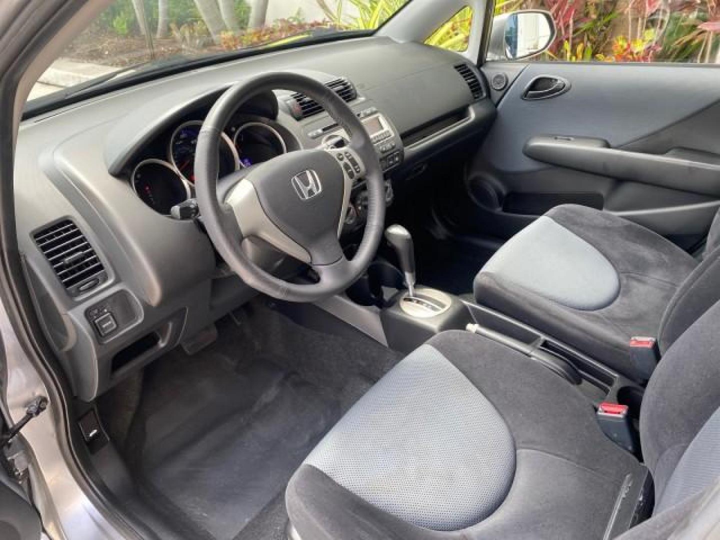 2007 Storm Silver Metallic /Black Honda Fit FIT Sport 1 OWNER LOW MILES 22,306 (JHMGD38607S) with an 1.5L SOHC PGM-FI 16-Valve VTEC I4 Engine engine, Automatic transmission, located at 4701 North Dixie Hwy, Pompano Beach, FL, 33064, (954) 422-2889, 26.240938, -80.123474 - OUR WEBPAGE FLORIDACARS1.COM HAS OVER 100 PHOTOS AND FREE CARFAX LINK 2007 Honda Fit Sport 1 OWNER Hatchback 4 DR 1.5L I4 F SOHC Gasoline 37 MPG Front Wheel Drive Features ABS Brakes Air Conditioning Alloy Wheels AM/FM Stereo Automatic Transmission Auxiliary Audio Input CD Audio Cloth Seats Cruise C- Photo#45