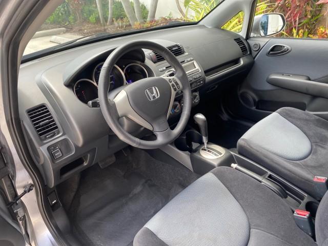 2007 Storm Silver Metallic /Black Honda Fit Sport 1 OWNER LOW MILES 22,306 (JHMGD38607S) with an 1.5L SOHC PGM-FI 16-Valve VTEC I4 Engine engine, Automatic transmission, located at 4701 North Dixie Hwy, Pompano Beach, FL, 33064, (954) 422-2889, 26.240938, -80.123474 - OUR WEBPAGE FLORIDACARS1.COM HAS OVER 100 PHOTOS AND FREE CARFAX LINK 2007 Honda Fit Sport 1 OWNER Hatchback 4 DR 1.5L I4 F SOHC Gasoline 37 MPG Front Wheel Drive Features ABS Brakes Air Conditioning Alloy Wheels AM/FM Stereo Automatic Transmission Auxiliary Audio Input CD Audio Cloth Seats Cruise C - Photo#46