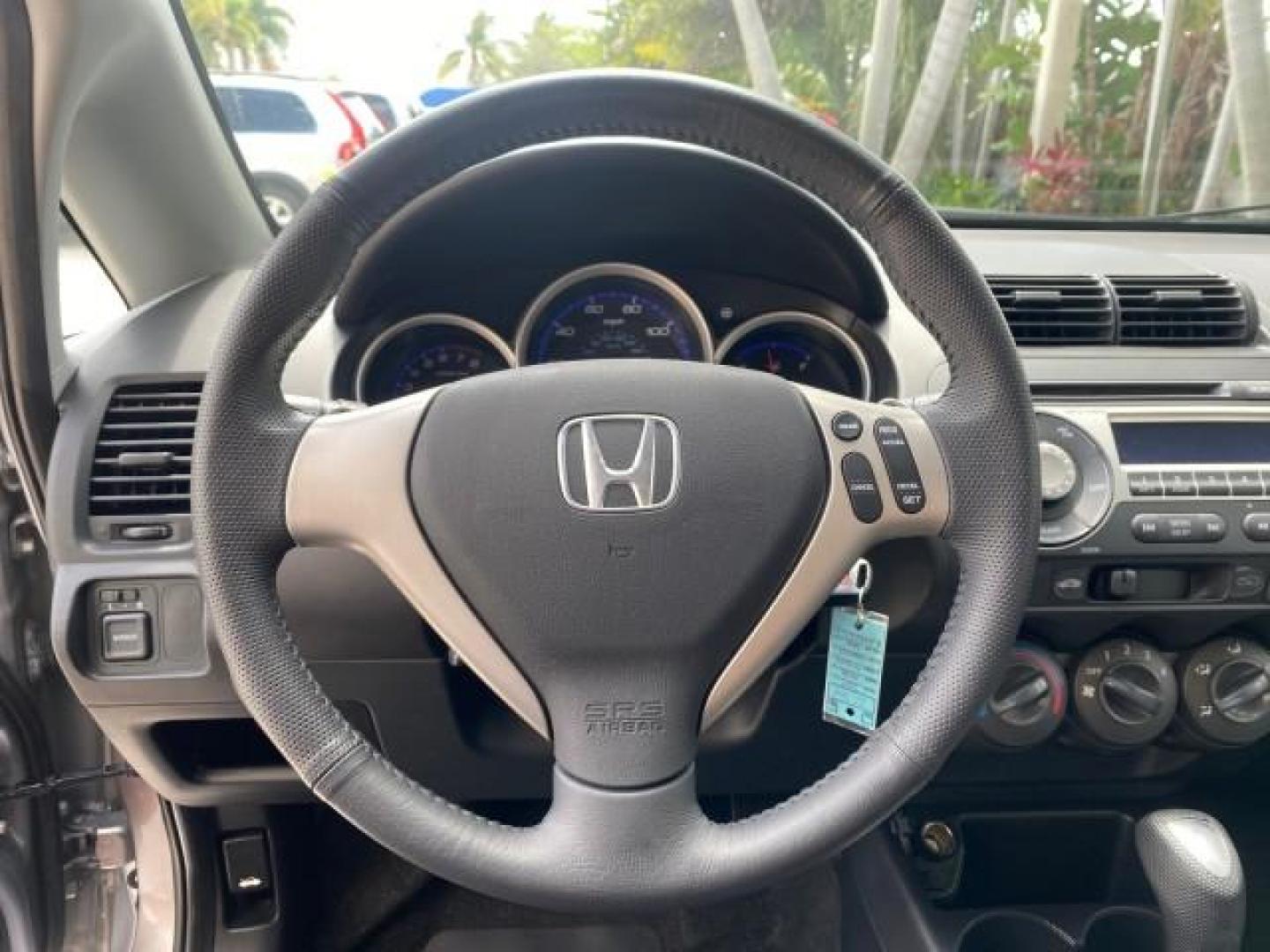 2007 Storm Silver Metallic /Black Honda Fit FIT Sport 1 OWNER LOW MILES 22,306 (JHMGD38607S) with an 1.5L SOHC PGM-FI 16-Valve VTEC I4 Engine engine, Automatic transmission, located at 4701 North Dixie Hwy, Pompano Beach, FL, 33064, (954) 422-2889, 26.240938, -80.123474 - OUR WEBPAGE FLORIDACARS1.COM HAS OVER 100 PHOTOS AND FREE CARFAX LINK 2007 Honda Fit Sport 1 OWNER Hatchback 4 DR 1.5L I4 F SOHC Gasoline 37 MPG Front Wheel Drive Features ABS Brakes Air Conditioning Alloy Wheels AM/FM Stereo Automatic Transmission Auxiliary Audio Input CD Audio Cloth Seats Cruise C- Photo#47