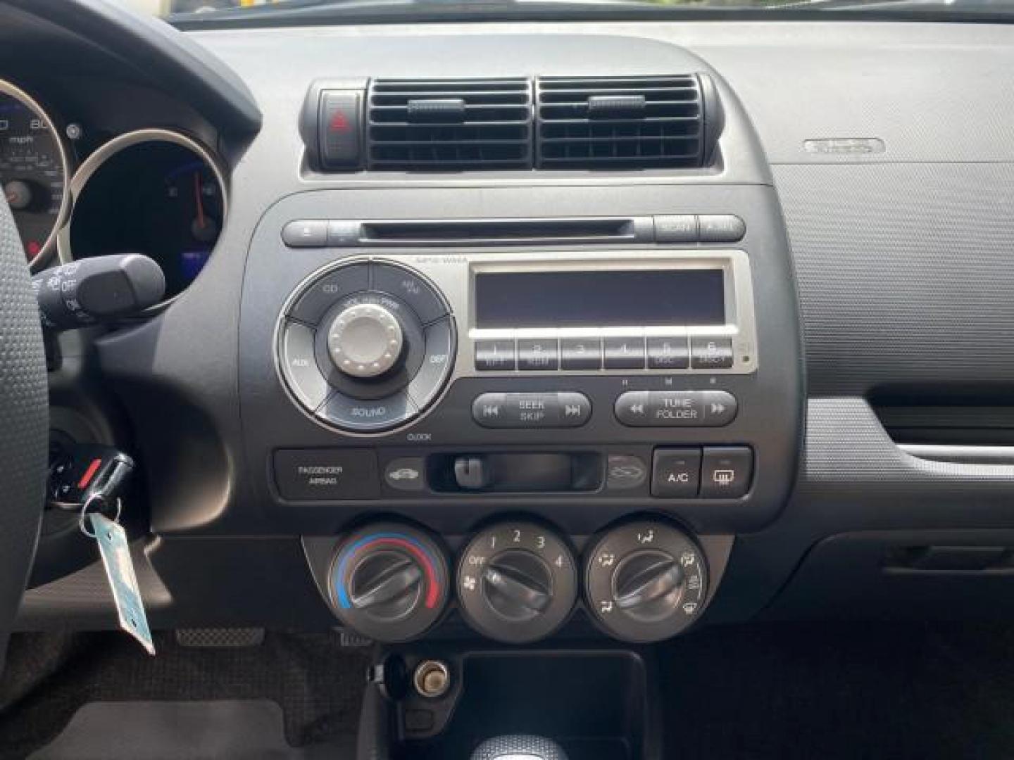 2007 Storm Silver Metallic /Black Honda Fit FIT Sport 1 OWNER LOW MILES 22,306 (JHMGD38607S) with an 1.5L SOHC PGM-FI 16-Valve VTEC I4 Engine engine, Automatic transmission, located at 4701 North Dixie Hwy, Pompano Beach, FL, 33064, (954) 422-2889, 26.240938, -80.123474 - OUR WEBPAGE FLORIDACARS1.COM HAS OVER 100 PHOTOS AND FREE CARFAX LINK 2007 Honda Fit Sport 1 OWNER Hatchback 4 DR 1.5L I4 F SOHC Gasoline 37 MPG Front Wheel Drive Features ABS Brakes Air Conditioning Alloy Wheels AM/FM Stereo Automatic Transmission Auxiliary Audio Input CD Audio Cloth Seats Cruise C- Photo#54