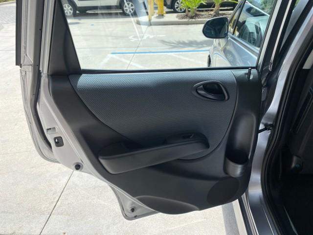 2007 Storm Silver Metallic /Black Honda Fit Sport 1 OWNER LOW MILES 22,306 (JHMGD38607S) with an 1.5L SOHC PGM-FI 16-Valve VTEC I4 Engine engine, Automatic transmission, located at 4701 North Dixie Hwy, Pompano Beach, FL, 33064, (954) 422-2889, 26.240938, -80.123474 - OUR WEBPAGE FLORIDACARS1.COM HAS OVER 100 PHOTOS AND FREE CARFAX LINK 2007 Honda Fit Sport 1 OWNER Hatchback 4 DR 1.5L I4 F SOHC Gasoline 37 MPG Front Wheel Drive Features ABS Brakes Air Conditioning Alloy Wheels AM/FM Stereo Automatic Transmission Auxiliary Audio Input CD Audio Cloth Seats Cruise C - Photo#70