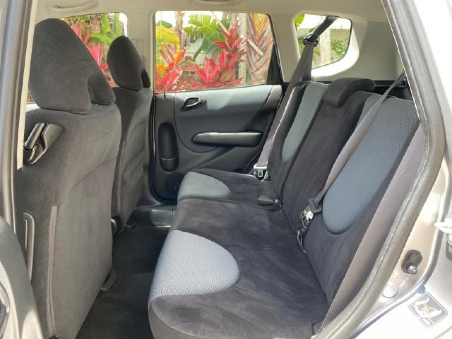 2007 Storm Silver Metallic /Black Honda Fit FIT Sport 1 OWNER LOW MILES 22,306 (JHMGD38607S) with an 1.5L SOHC PGM-FI 16-Valve VTEC I4 Engine engine, Automatic transmission, located at 4701 North Dixie Hwy, Pompano Beach, FL, 33064, (954) 422-2889, 26.240938, -80.123474 - OUR WEBPAGE FLORIDACARS1.COM HAS OVER 100 PHOTOS AND FREE CARFAX LINK 2007 Honda Fit Sport 1 OWNER Hatchback 4 DR 1.5L I4 F SOHC Gasoline 37 MPG Front Wheel Drive Features ABS Brakes Air Conditioning Alloy Wheels AM/FM Stereo Automatic Transmission Auxiliary Audio Input CD Audio Cloth Seats Cruise C- Photo#71