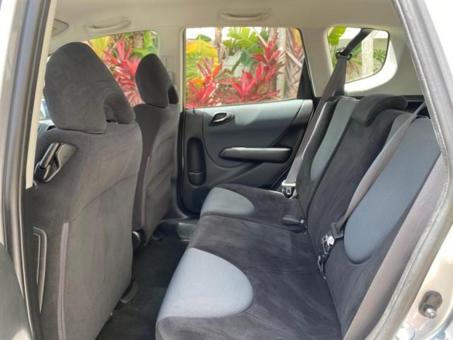 2007 Storm Silver Metallic /Black Honda Fit FIT Sport 1 OWNER LOW MILES 22,306 (JHMGD38607S) with an 1.5L SOHC PGM-FI 16-Valve VTEC I4 Engine engine, Automatic transmission, located at 4701 North Dixie Hwy, Pompano Beach, FL, 33064, (954) 422-2889, 26.240938, -80.123474 - OUR WEBPAGE FLORIDACARS1.COM HAS OVER 100 PHOTOS AND FREE CARFAX LINK 2007 Honda Fit Sport 1 OWNER Hatchback 4 DR 1.5L I4 F SOHC Gasoline 37 MPG Front Wheel Drive Features ABS Brakes Air Conditioning Alloy Wheels AM/FM Stereo Automatic Transmission Auxiliary Audio Input CD Audio Cloth Seats Cruise C- Photo#72