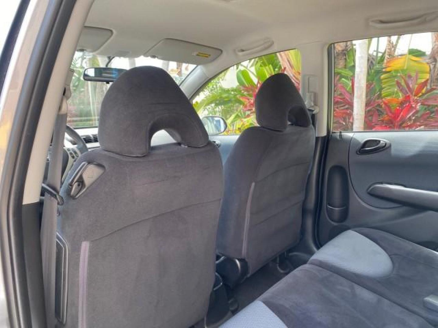 2007 Storm Silver Metallic /Black Honda Fit FIT Sport 1 OWNER LOW MILES 22,306 (JHMGD38607S) with an 1.5L SOHC PGM-FI 16-Valve VTEC I4 Engine engine, Automatic transmission, located at 4701 North Dixie Hwy, Pompano Beach, FL, 33064, (954) 422-2889, 26.240938, -80.123474 - OUR WEBPAGE FLORIDACARS1.COM HAS OVER 100 PHOTOS AND FREE CARFAX LINK 2007 Honda Fit Sport 1 OWNER Hatchback 4 DR 1.5L I4 F SOHC Gasoline 37 MPG Front Wheel Drive Features ABS Brakes Air Conditioning Alloy Wheels AM/FM Stereo Automatic Transmission Auxiliary Audio Input CD Audio Cloth Seats Cruise C- Photo#75