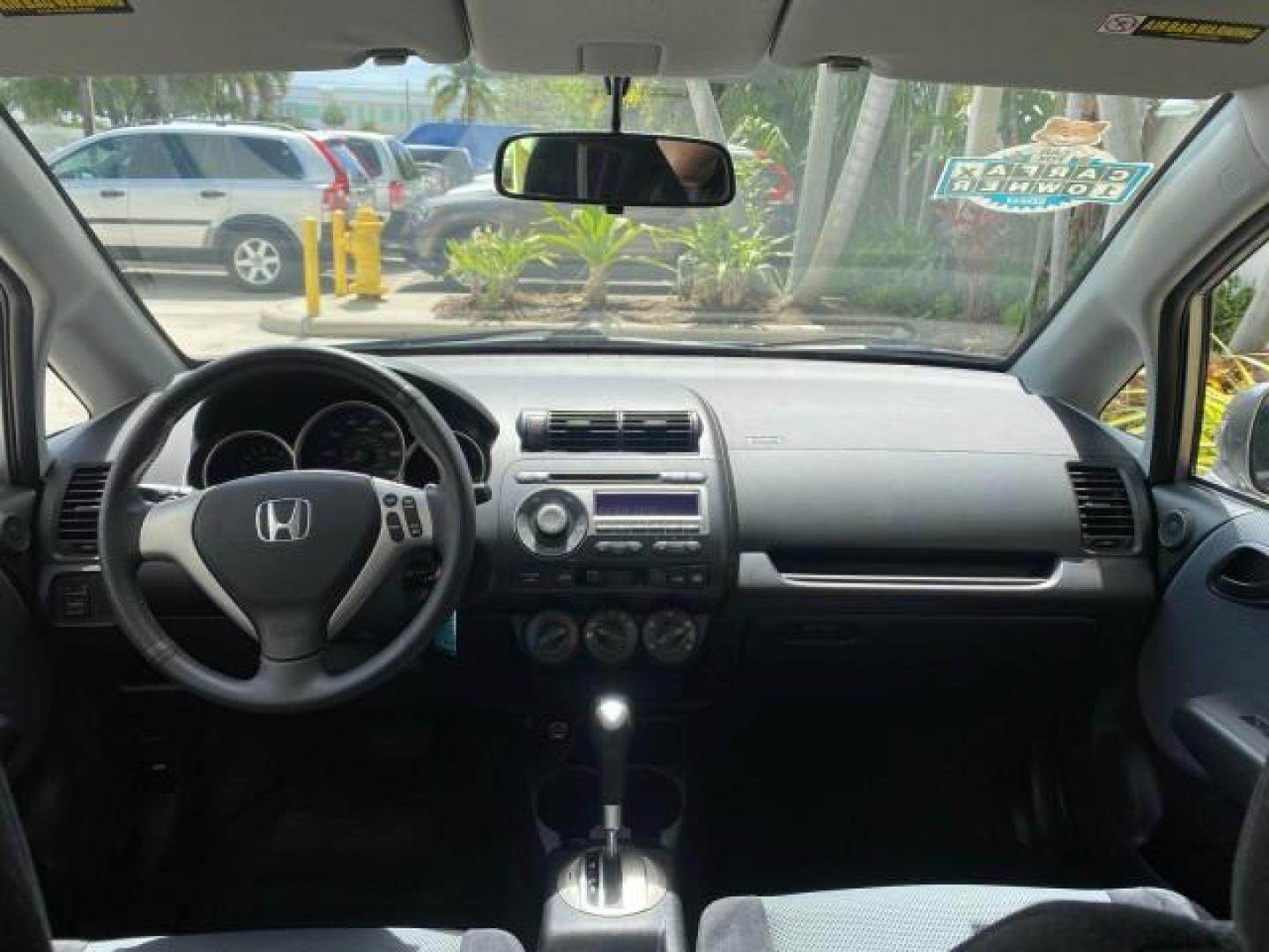 2007 Storm Silver Metallic /Black Honda Fit FIT Sport 1 OWNER LOW MILES 22,306 (JHMGD38607S) with an 1.5L SOHC PGM-FI 16-Valve VTEC I4 Engine engine, Automatic transmission, located at 4701 North Dixie Hwy, Pompano Beach, FL, 33064, (954) 422-2889, 26.240938, -80.123474 - OUR WEBPAGE FLORIDACARS1.COM HAS OVER 100 PHOTOS AND FREE CARFAX LINK 2007 Honda Fit Sport 1 OWNER Hatchback 4 DR 1.5L I4 F SOHC Gasoline 37 MPG Front Wheel Drive Features ABS Brakes Air Conditioning Alloy Wheels AM/FM Stereo Automatic Transmission Auxiliary Audio Input CD Audio Cloth Seats Cruise C- Photo#76