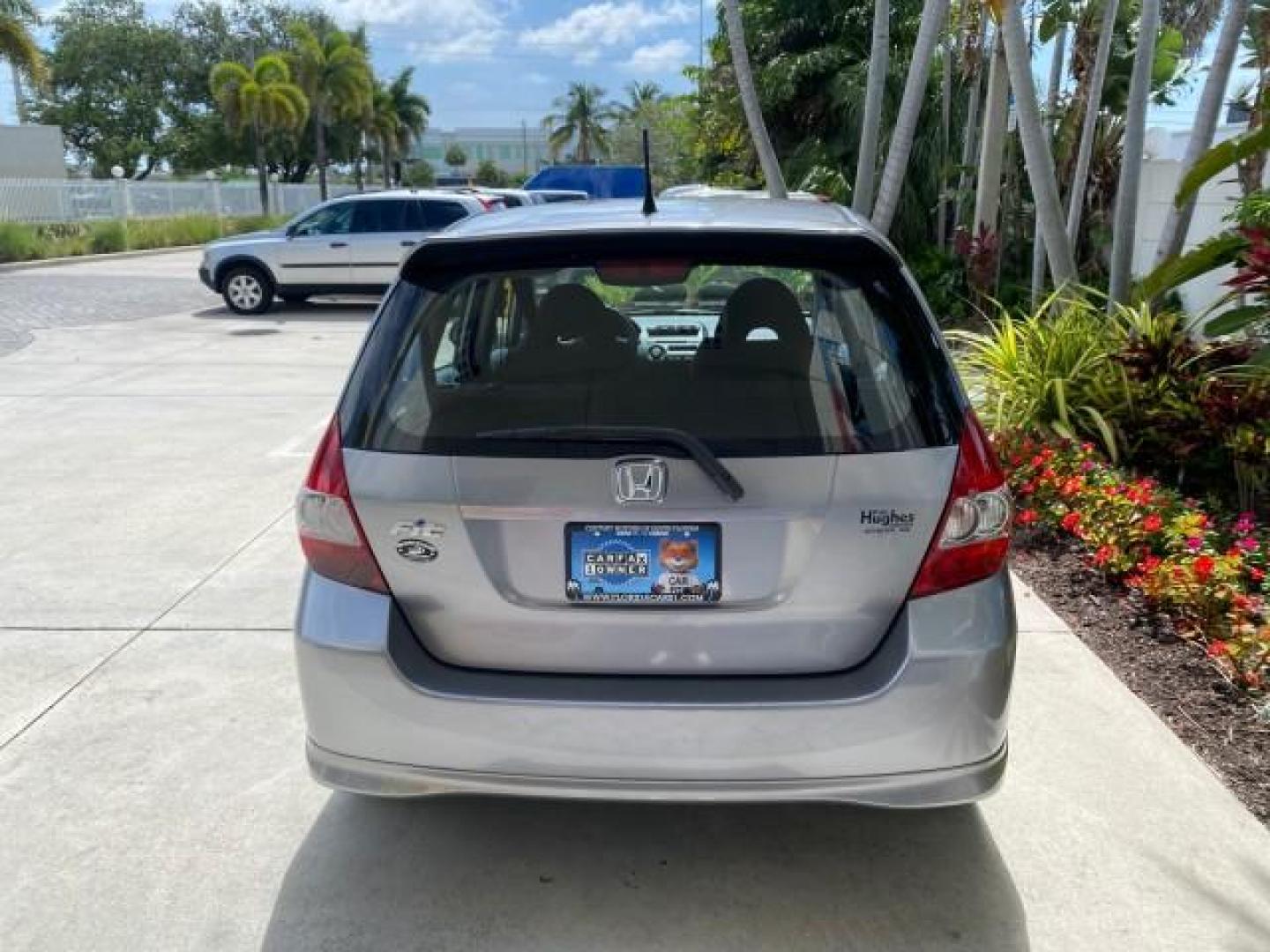 2007 Storm Silver Metallic /Black Honda Fit FIT Sport 1 OWNER LOW MILES 22,306 (JHMGD38607S) with an 1.5L SOHC PGM-FI 16-Valve VTEC I4 Engine engine, Automatic transmission, located at 4701 North Dixie Hwy, Pompano Beach, FL, 33064, (954) 422-2889, 26.240938, -80.123474 - OUR WEBPAGE FLORIDACARS1.COM HAS OVER 100 PHOTOS AND FREE CARFAX LINK 2007 Honda Fit Sport 1 OWNER Hatchback 4 DR 1.5L I4 F SOHC Gasoline 37 MPG Front Wheel Drive Features ABS Brakes Air Conditioning Alloy Wheels AM/FM Stereo Automatic Transmission Auxiliary Audio Input CD Audio Cloth Seats Cruise C- Photo#82