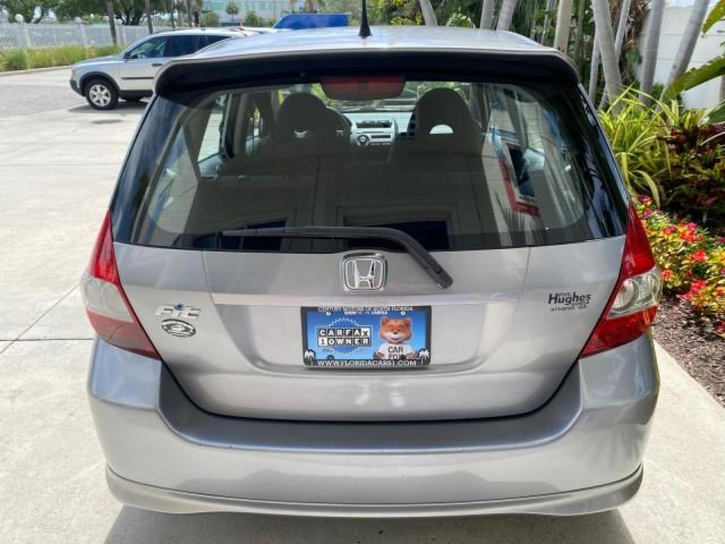 2007 Storm Silver Metallic /Black Honda Fit FIT Sport 1 OWNER LOW MILES 22,306 (JHMGD38607S) with an 1.5L SOHC PGM-FI 16-Valve VTEC I4 Engine engine, Automatic transmission, located at 4701 North Dixie Hwy, Pompano Beach, FL, 33064, (954) 422-2889, 26.240938, -80.123474 - OUR WEBPAGE FLORIDACARS1.COM HAS OVER 100 PHOTOS AND FREE CARFAX LINK 2007 Honda Fit Sport 1 OWNER Hatchback 4 DR 1.5L I4 F SOHC Gasoline 37 MPG Front Wheel Drive Features ABS Brakes Air Conditioning Alloy Wheels AM/FM Stereo Automatic Transmission Auxiliary Audio Input CD Audio Cloth Seats Cruise C- Photo#83