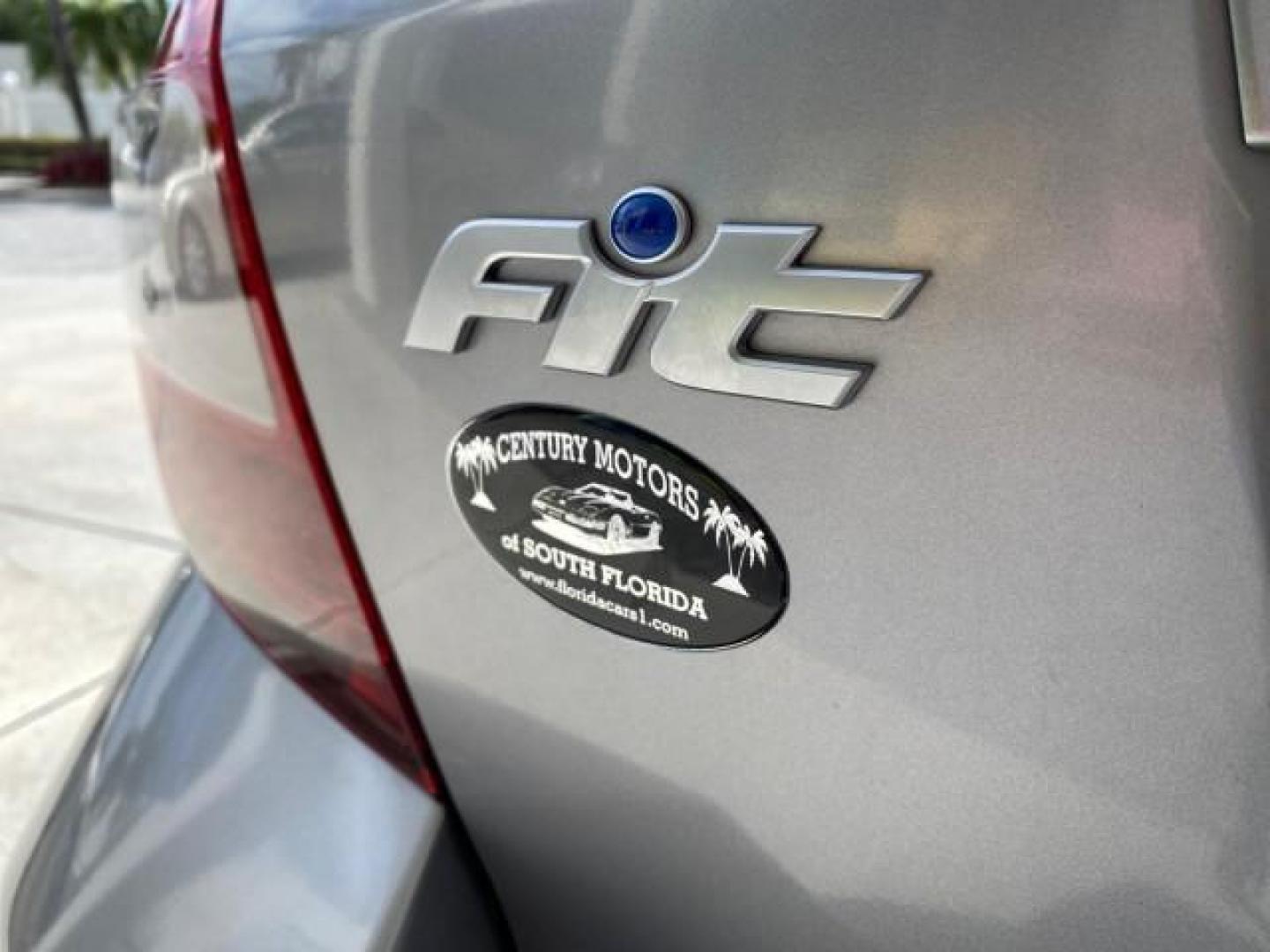 2007 Storm Silver Metallic /Black Honda Fit FIT Sport 1 OWNER LOW MILES 22,306 (JHMGD38607S) with an 1.5L SOHC PGM-FI 16-Valve VTEC I4 Engine engine, Automatic transmission, located at 4701 North Dixie Hwy, Pompano Beach, FL, 33064, (954) 422-2889, 26.240938, -80.123474 - OUR WEBPAGE FLORIDACARS1.COM HAS OVER 100 PHOTOS AND FREE CARFAX LINK 2007 Honda Fit Sport 1 OWNER Hatchback 4 DR 1.5L I4 F SOHC Gasoline 37 MPG Front Wheel Drive Features ABS Brakes Air Conditioning Alloy Wheels AM/FM Stereo Automatic Transmission Auxiliary Audio Input CD Audio Cloth Seats Cruise C- Photo#84