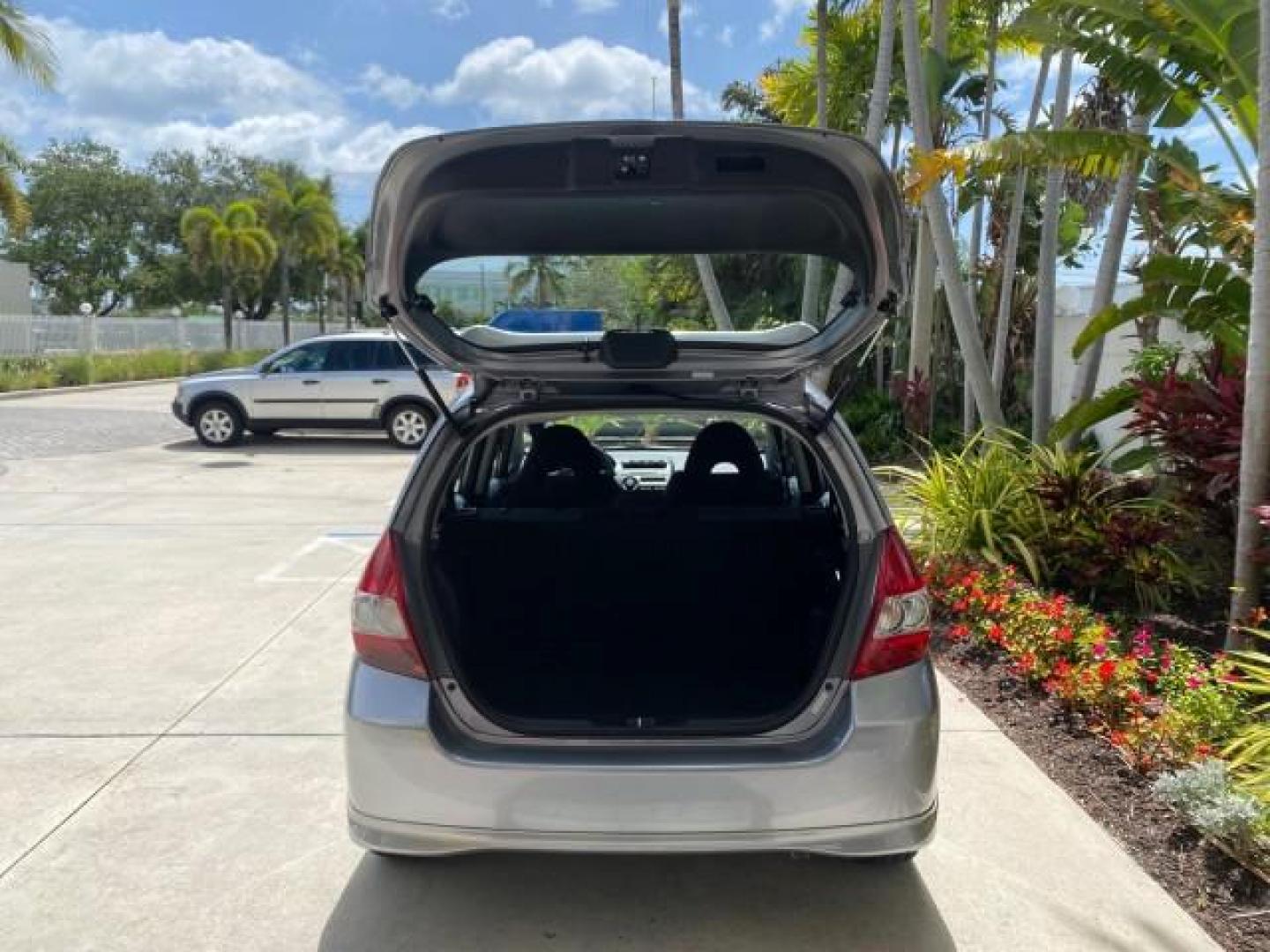 2007 Storm Silver Metallic /Black Honda Fit FIT Sport 1 OWNER LOW MILES 22,306 (JHMGD38607S) with an 1.5L SOHC PGM-FI 16-Valve VTEC I4 Engine engine, Automatic transmission, located at 4701 North Dixie Hwy, Pompano Beach, FL, 33064, (954) 422-2889, 26.240938, -80.123474 - OUR WEBPAGE FLORIDACARS1.COM HAS OVER 100 PHOTOS AND FREE CARFAX LINK 2007 Honda Fit Sport 1 OWNER Hatchback 4 DR 1.5L I4 F SOHC Gasoline 37 MPG Front Wheel Drive Features ABS Brakes Air Conditioning Alloy Wheels AM/FM Stereo Automatic Transmission Auxiliary Audio Input CD Audio Cloth Seats Cruise C- Photo#87