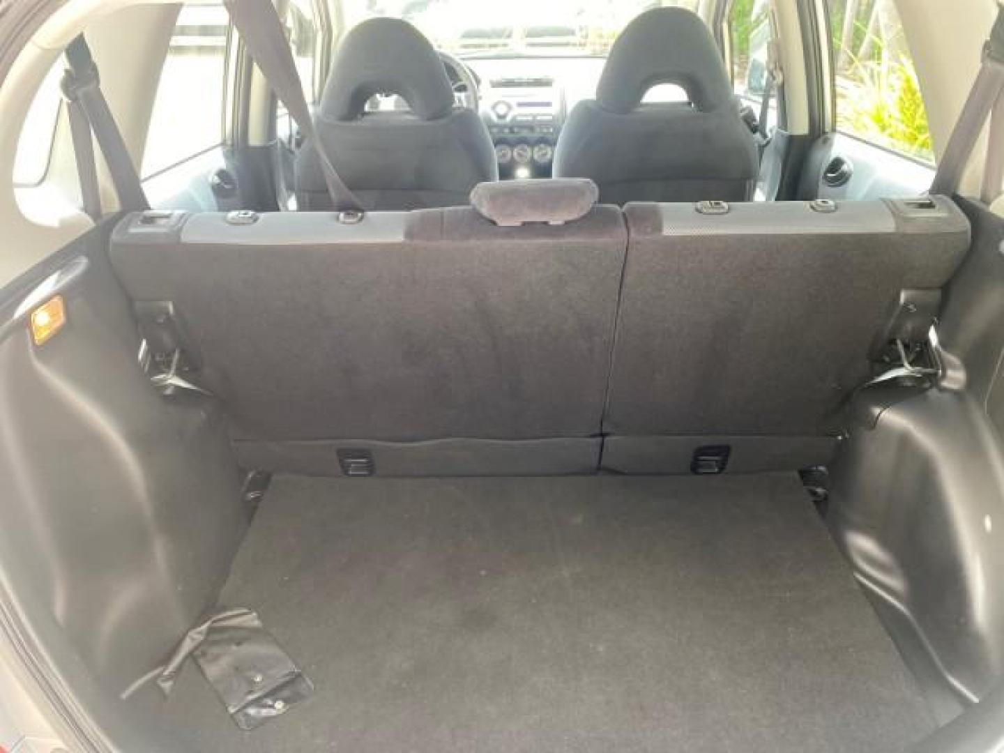 2007 Storm Silver Metallic /Black Honda Fit FIT Sport 1 OWNER LOW MILES 22,306 (JHMGD38607S) with an 1.5L SOHC PGM-FI 16-Valve VTEC I4 Engine engine, Automatic transmission, located at 4701 North Dixie Hwy, Pompano Beach, FL, 33064, (954) 422-2889, 26.240938, -80.123474 - OUR WEBPAGE FLORIDACARS1.COM HAS OVER 100 PHOTOS AND FREE CARFAX LINK 2007 Honda Fit Sport 1 OWNER Hatchback 4 DR 1.5L I4 F SOHC Gasoline 37 MPG Front Wheel Drive Features ABS Brakes Air Conditioning Alloy Wheels AM/FM Stereo Automatic Transmission Auxiliary Audio Input CD Audio Cloth Seats Cruise C- Photo#89
