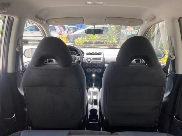 2007 Storm Silver Metallic /Black Honda Fit Sport 1 OWNER LOW MILES 22,306 (JHMGD38607S) with an 1.5L SOHC PGM-FI 16-Valve VTEC I4 Engine engine, Automatic transmission, located at 4701 North Dixie Hwy, Pompano Beach, FL, 33064, (954) 422-2889, 26.240938, -80.123474 - OUR WEBPAGE FLORIDACARS1.COM HAS OVER 100 PHOTOS AND FREE CARFAX LINK 2007 Honda Fit Sport 1 OWNER Hatchback 4 DR 1.5L I4 F SOHC Gasoline 37 MPG Front Wheel Drive Features ABS Brakes Air Conditioning Alloy Wheels AM/FM Stereo Automatic Transmission Auxiliary Audio Input CD Audio Cloth Seats Cruise C - Photo#90