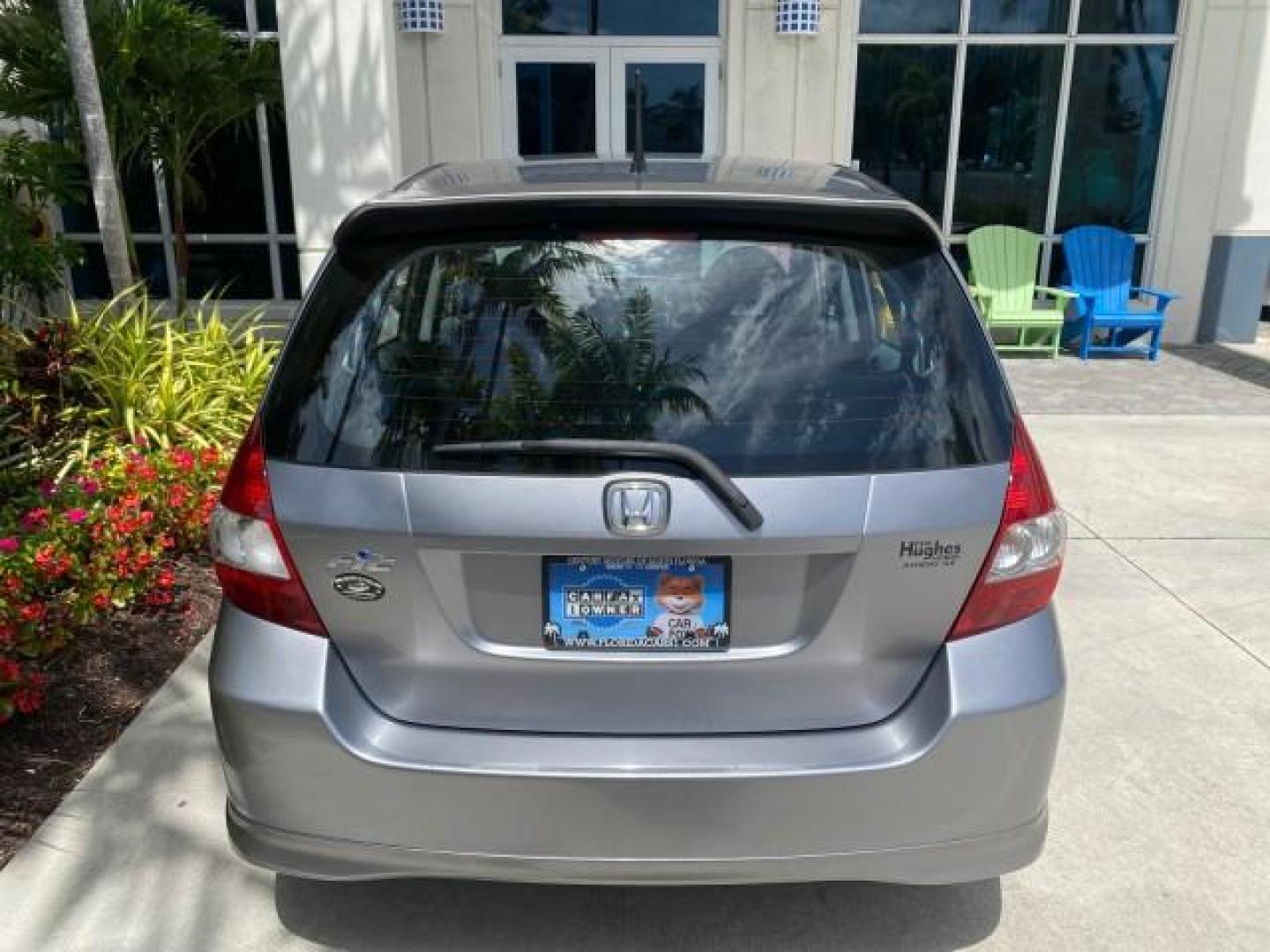 2007 Storm Silver Metallic /Black Honda Fit FIT Sport 1 OWNER LOW MILES 22,306 (JHMGD38607S) with an 1.5L SOHC PGM-FI 16-Valve VTEC I4 Engine engine, Automatic transmission, located at 4701 North Dixie Hwy, Pompano Beach, FL, 33064, (954) 422-2889, 26.240938, -80.123474 - OUR WEBPAGE FLORIDACARS1.COM HAS OVER 100 PHOTOS AND FREE CARFAX LINK 2007 Honda Fit Sport 1 OWNER Hatchback 4 DR 1.5L I4 F SOHC Gasoline 37 MPG Front Wheel Drive Features ABS Brakes Air Conditioning Alloy Wheels AM/FM Stereo Automatic Transmission Auxiliary Audio Input CD Audio Cloth Seats Cruise C- Photo#95