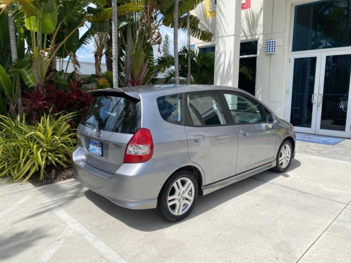 2007 Storm Silver Metallic /Black Honda Fit FIT Sport 1 OWNER LOW MILES 22,306 (JHMGD38607S) with an 1.5L SOHC PGM-FI 16-Valve VTEC I4 Engine engine, Automatic transmission, located at 4701 North Dixie Hwy, Pompano Beach, FL, 33064, (954) 422-2889, 26.240938, -80.123474 - OUR WEBPAGE FLORIDACARS1.COM HAS OVER 100 PHOTOS AND FREE CARFAX LINK 2007 Honda Fit Sport 1 OWNER Hatchback 4 DR 1.5L I4 F SOHC Gasoline 37 MPG Front Wheel Drive Features ABS Brakes Air Conditioning Alloy Wheels AM/FM Stereo Automatic Transmission Auxiliary Audio Input CD Audio Cloth Seats Cruise C- Photo#96