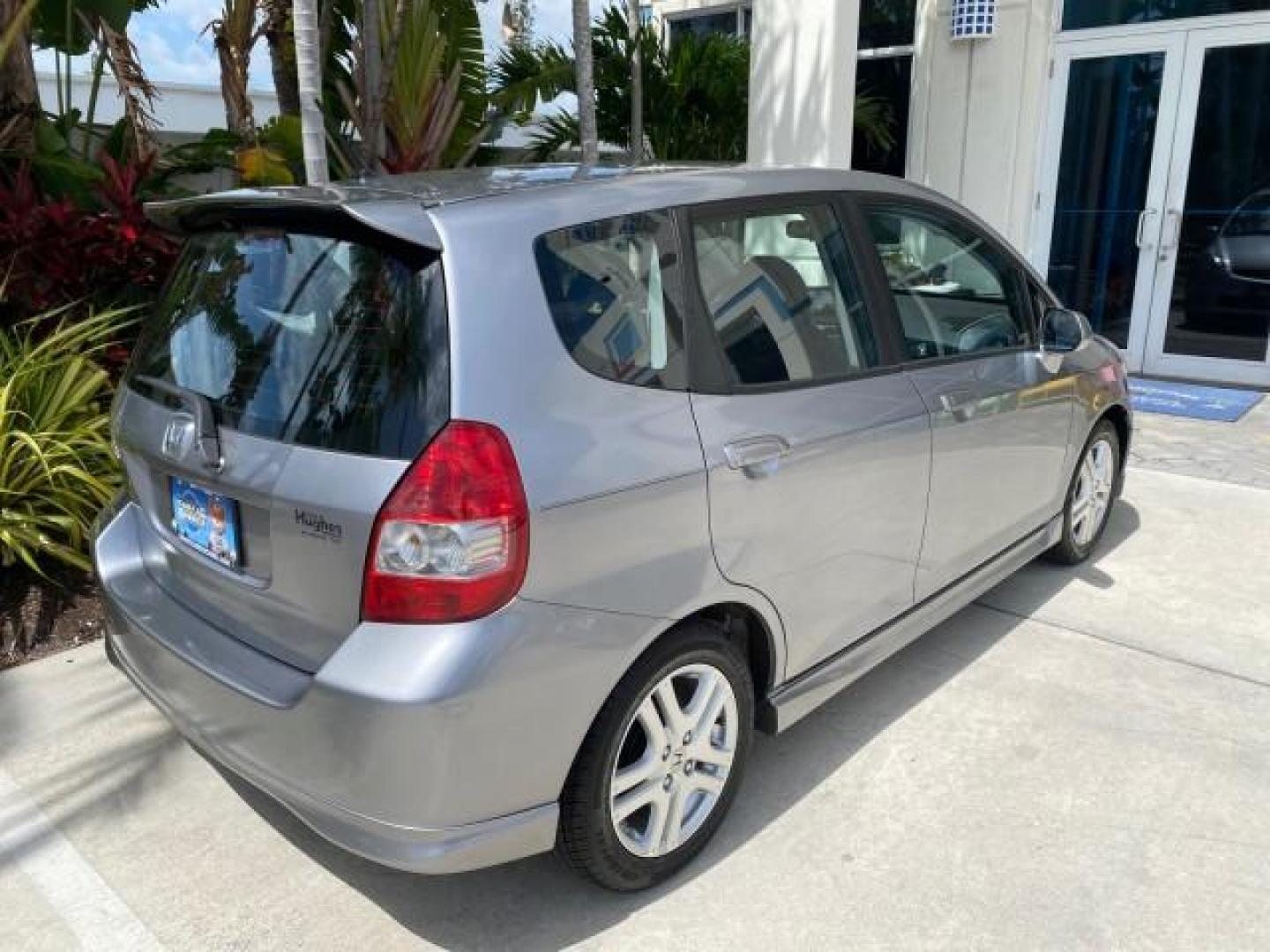 2007 Storm Silver Metallic /Black Honda Fit FIT Sport 1 OWNER LOW MILES 22,306 (JHMGD38607S) with an 1.5L SOHC PGM-FI 16-Valve VTEC I4 Engine engine, Automatic transmission, located at 4701 North Dixie Hwy, Pompano Beach, FL, 33064, (954) 422-2889, 26.240938, -80.123474 - OUR WEBPAGE FLORIDACARS1.COM HAS OVER 100 PHOTOS AND FREE CARFAX LINK 2007 Honda Fit Sport 1 OWNER Hatchback 4 DR 1.5L I4 F SOHC Gasoline 37 MPG Front Wheel Drive Features ABS Brakes Air Conditioning Alloy Wheels AM/FM Stereo Automatic Transmission Auxiliary Audio Input CD Audio Cloth Seats Cruise C- Photo#97