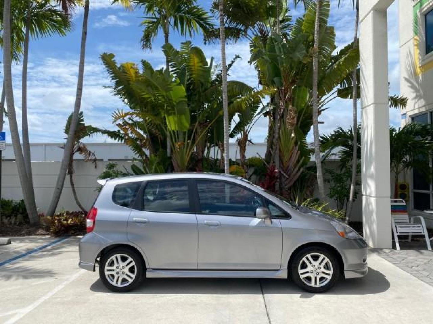 2007 Storm Silver Metallic /Black Honda Fit FIT Sport 1 OWNER LOW MILES 22,306 (JHMGD38607S) with an 1.5L SOHC PGM-FI 16-Valve VTEC I4 Engine engine, Automatic transmission, located at 4701 North Dixie Hwy, Pompano Beach, FL, 33064, (954) 422-2889, 26.240938, -80.123474 - OUR WEBPAGE FLORIDACARS1.COM HAS OVER 100 PHOTOS AND FREE CARFAX LINK 2007 Honda Fit Sport 1 OWNER Hatchback 4 DR 1.5L I4 F SOHC Gasoline 37 MPG Front Wheel Drive Features ABS Brakes Air Conditioning Alloy Wheels AM/FM Stereo Automatic Transmission Auxiliary Audio Input CD Audio Cloth Seats Cruise C- Photo#98