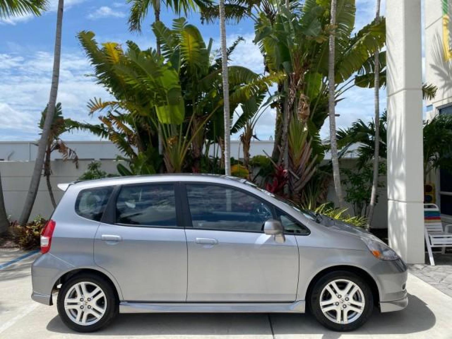 2007 Storm Silver Metallic /Black Honda Fit FIT Sport 1 OWNER LOW MILES 22,306 (JHMGD38607S) with an 1.5L SOHC PGM-FI 16-Valve VTEC I4 Engine engine, Automatic transmission, located at 4701 North Dixie Hwy, Pompano Beach, FL, 33064, (954) 422-2889, 26.240938, -80.123474 - OUR WEBPAGE FLORIDACARS1.COM HAS OVER 100 PHOTOS AND FREE CARFAX LINK 2007 Honda Fit Sport 1 OWNER Hatchback 4 DR 1.5L I4 F SOHC Gasoline 37 MPG Front Wheel Drive Features ABS Brakes Air Conditioning Alloy Wheels AM/FM Stereo Automatic Transmission Auxiliary Audio Input CD Audio Cloth Seats Cruise C- Photo#99